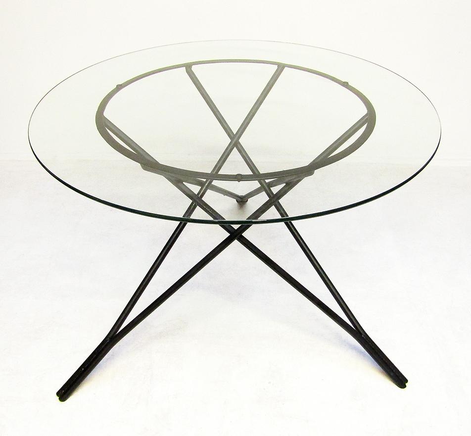 A modernist tripod dining table, similar in form to Maurizio Tempestini or Salterini tables.
 
Of 1960s vintage, it would go very well with our Carl Jacobs 