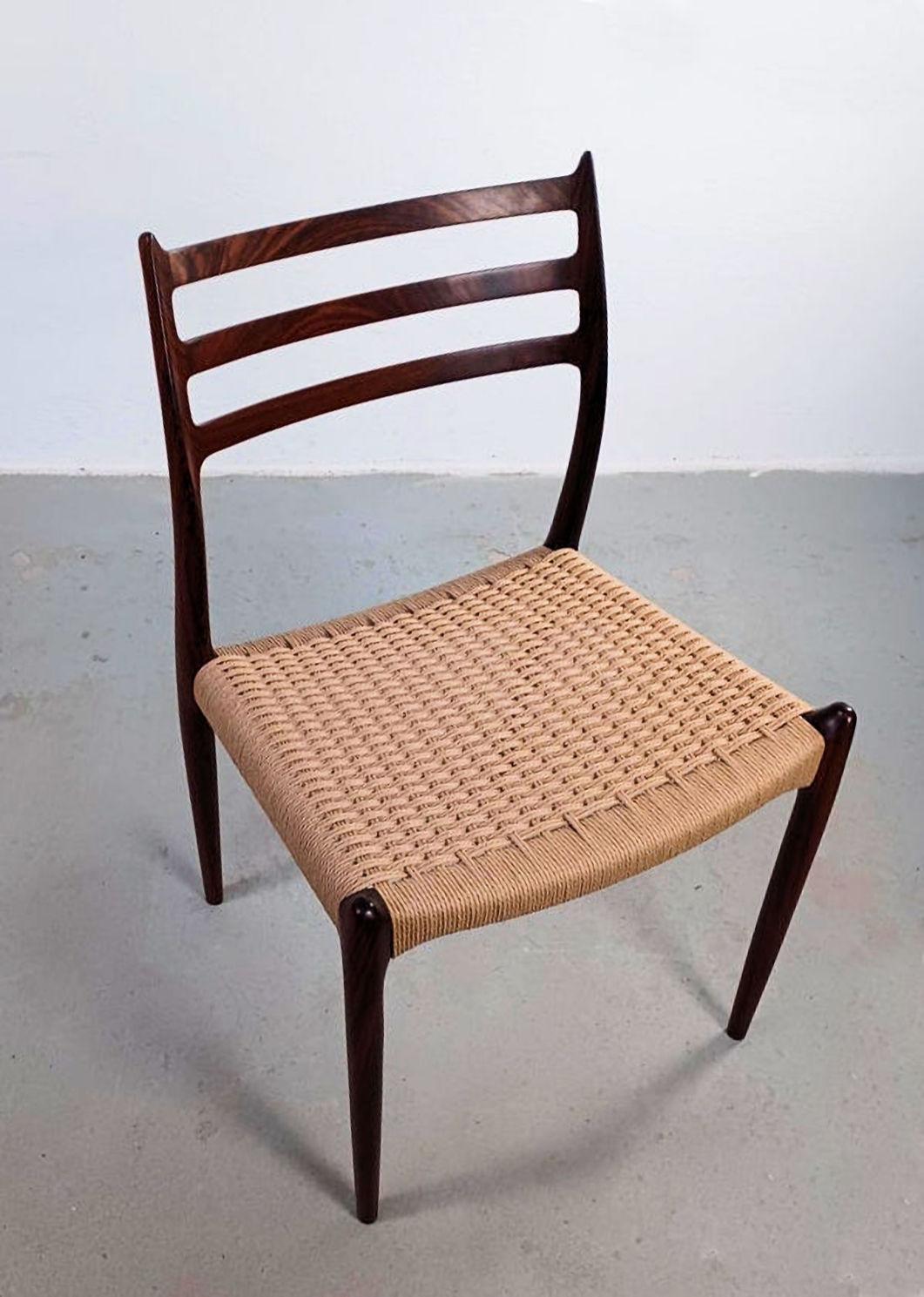 1960er Jahre Zehn vollständig restaurierte N.O. Moller Palisander Papercord Esszimmerstühle im Angebot 1