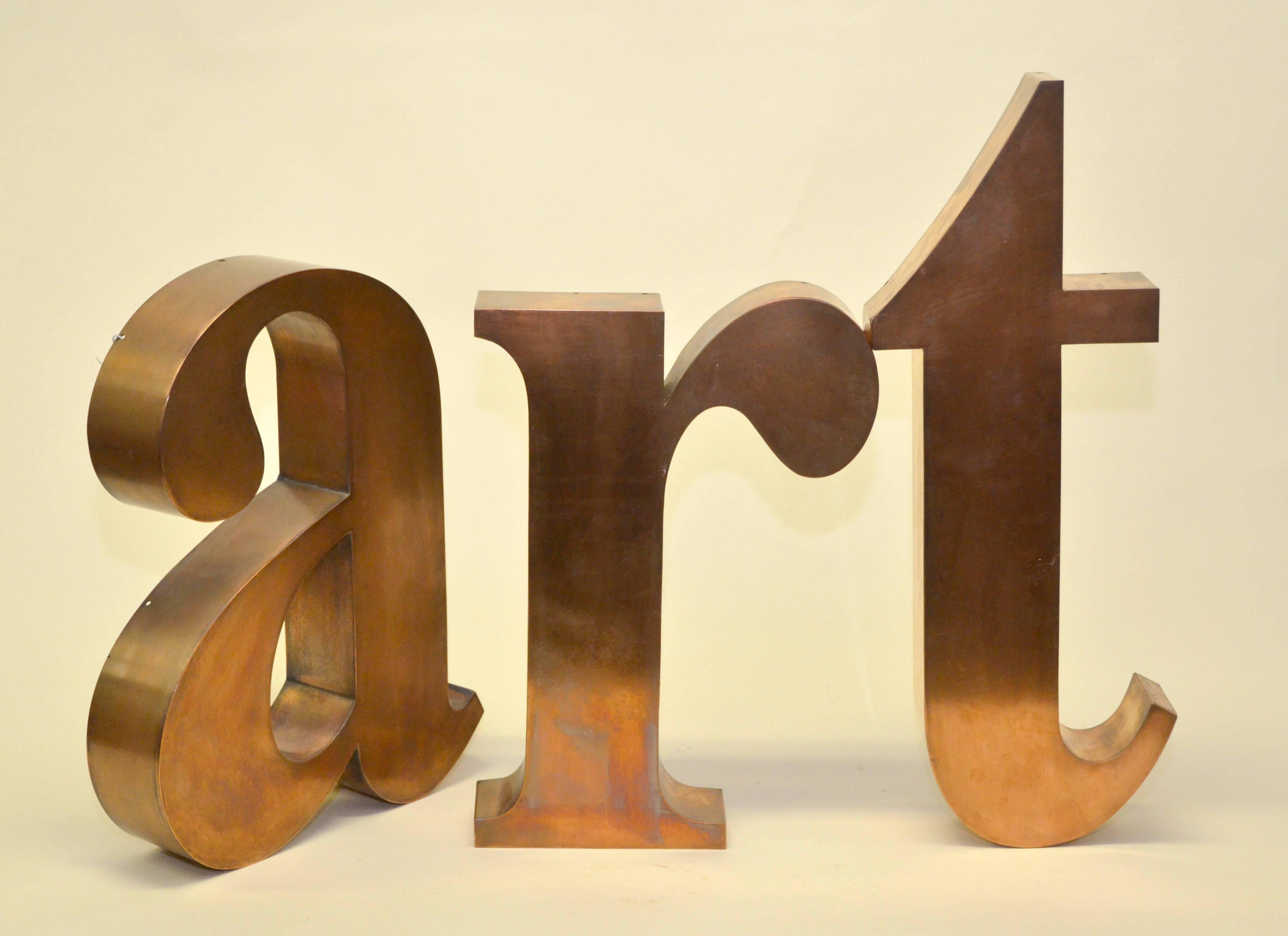 Very collectible group of three Italian lowercase italics letters a, r and t in copper made in the 1960s. 

Grouped together the letters create the word: ART.