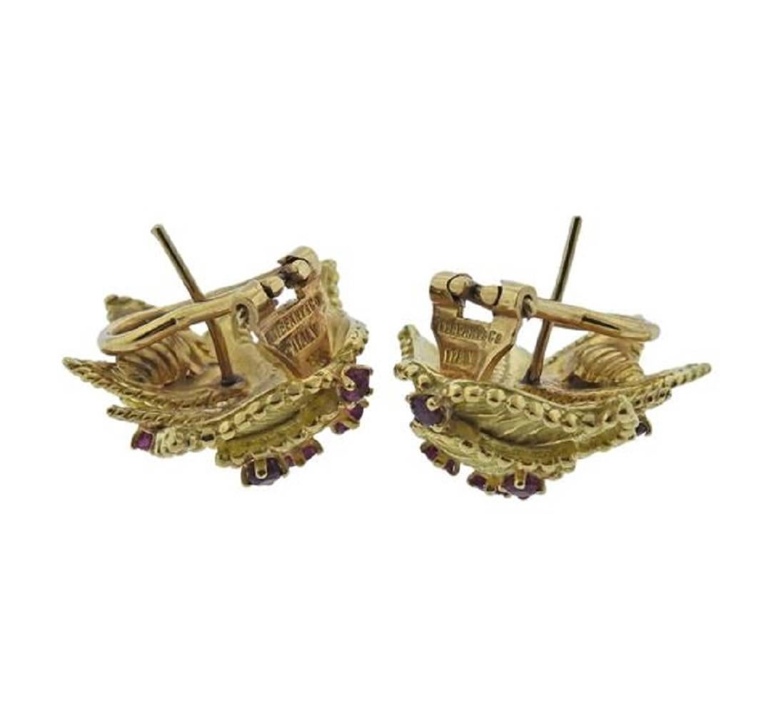  Pair of 1960s 18k gold earrings, crafted by Tiffany & Co, decorated with rubies. Earrings are 25 x 22mm at widest point, weigh 17.8 grams. Marked: Tiffany & Co 18K Italy.