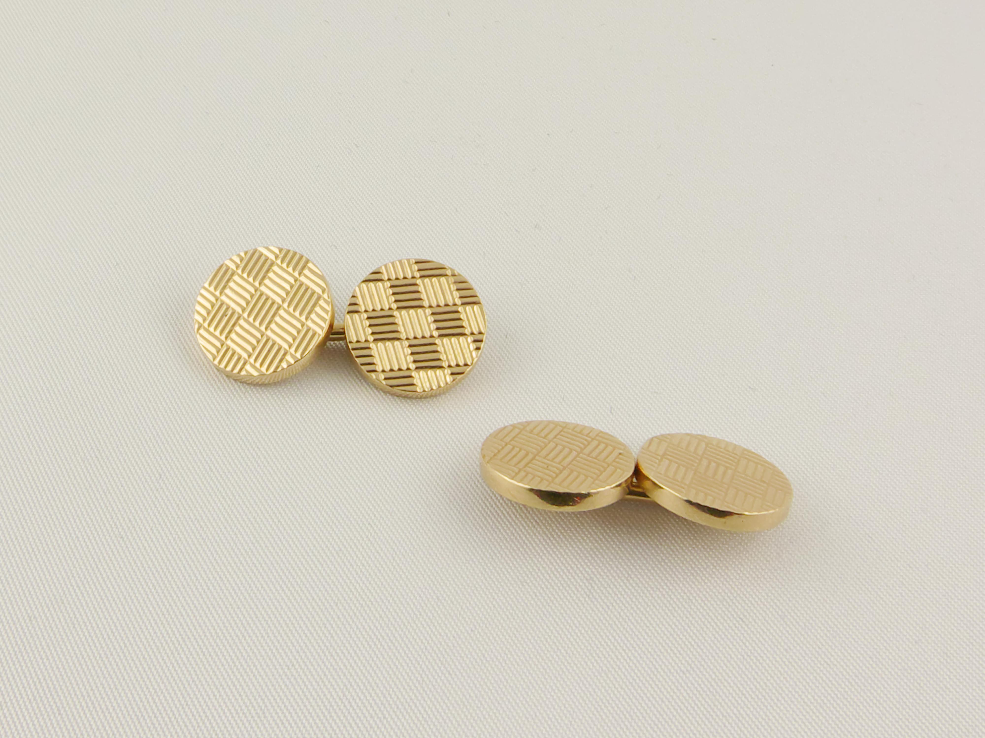 1960's Tiffany & Co. round Engraved Double-Sided Yellow Gold Cufflinks
For the sophisticated gentleman, these fabulous  Yellow Gold Cufflinks have a textured Geometric Checkerboard Design and are marked  TIFFANY & CO. They are solid and very chic 
