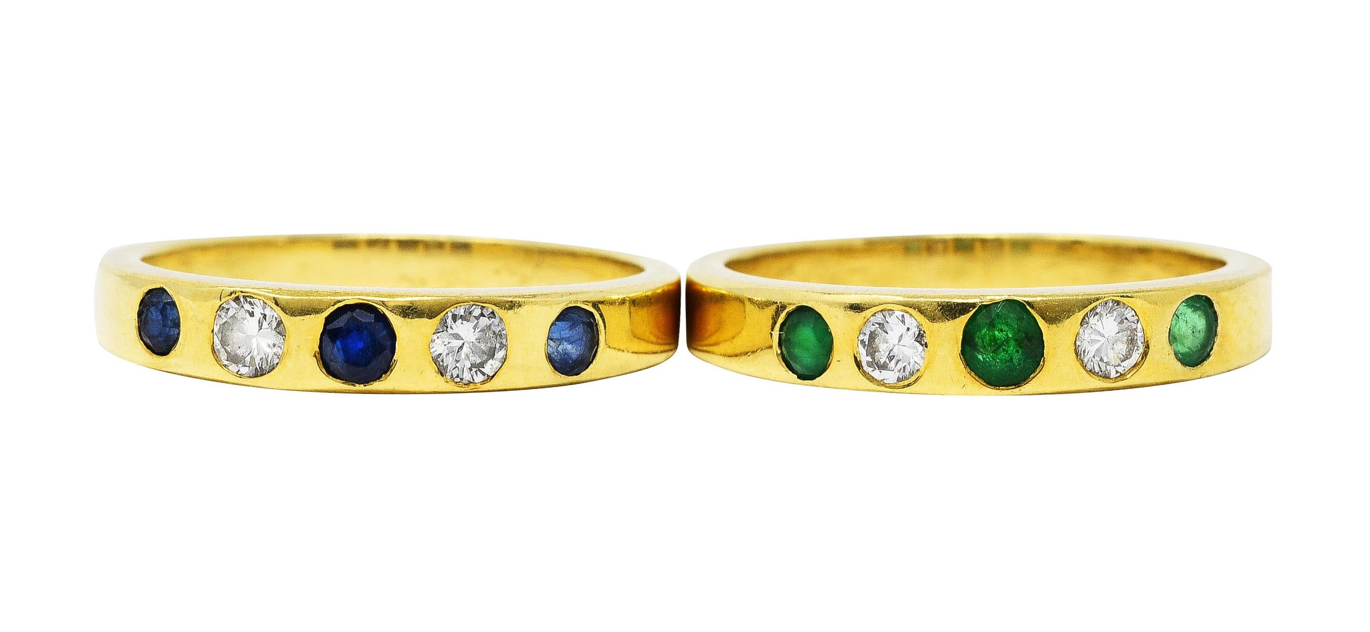 Set of two band style rings designed with five stones each flush set to front

Featuring diamonds alternating with either sapphires or emeralds on each band

Diamonds weigh approximately 0.26 carat in total - F/G in color with VS clarity

Colored