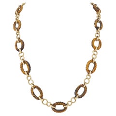 Collana vintage con catena a maglie ritorte in oro giallo 14 carati degli anni '60 con occhio di tigre