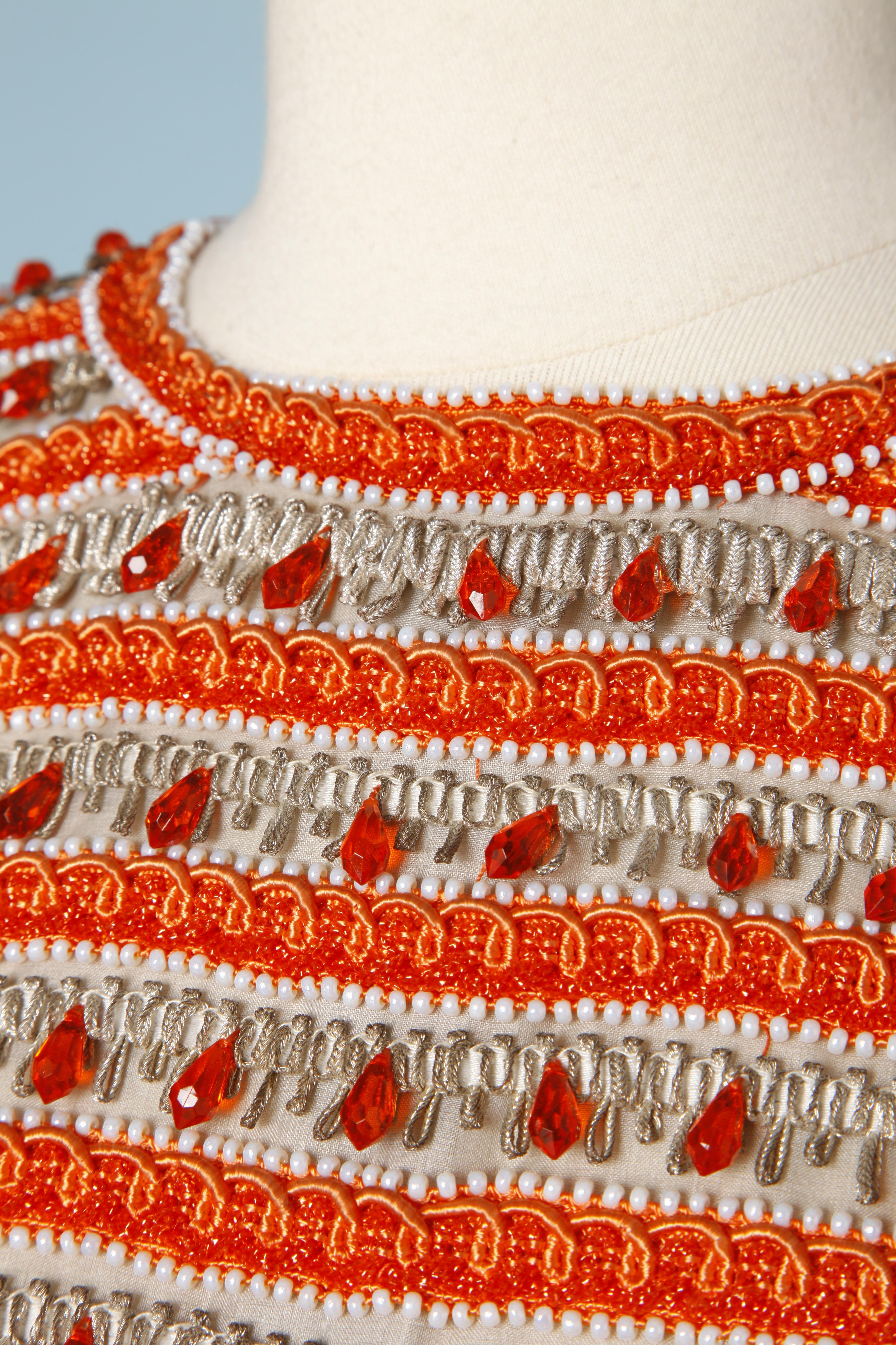 1960's top with orange and white beads and silver and orange passementerie 
SIZE S ( Fr 36)