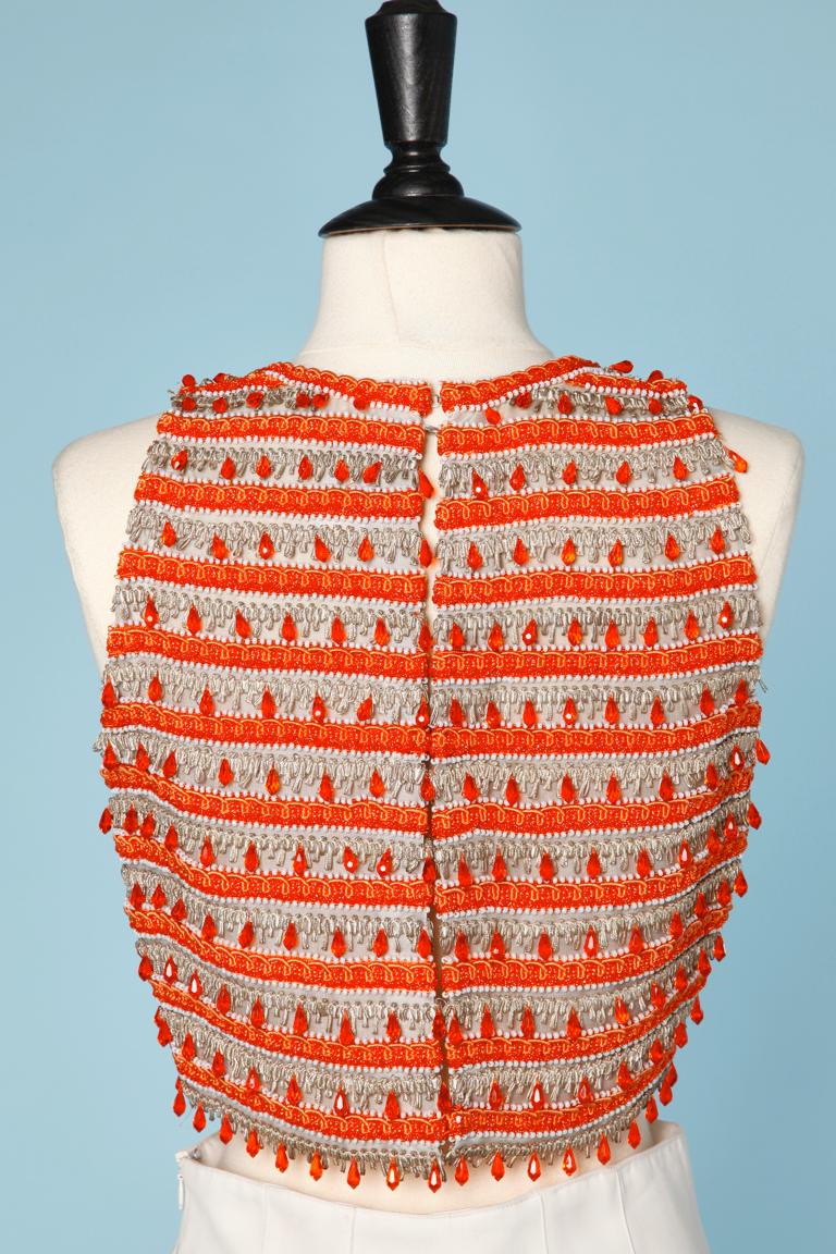 Women's 1960's top with orange and white beads and silver and orange passementerie 