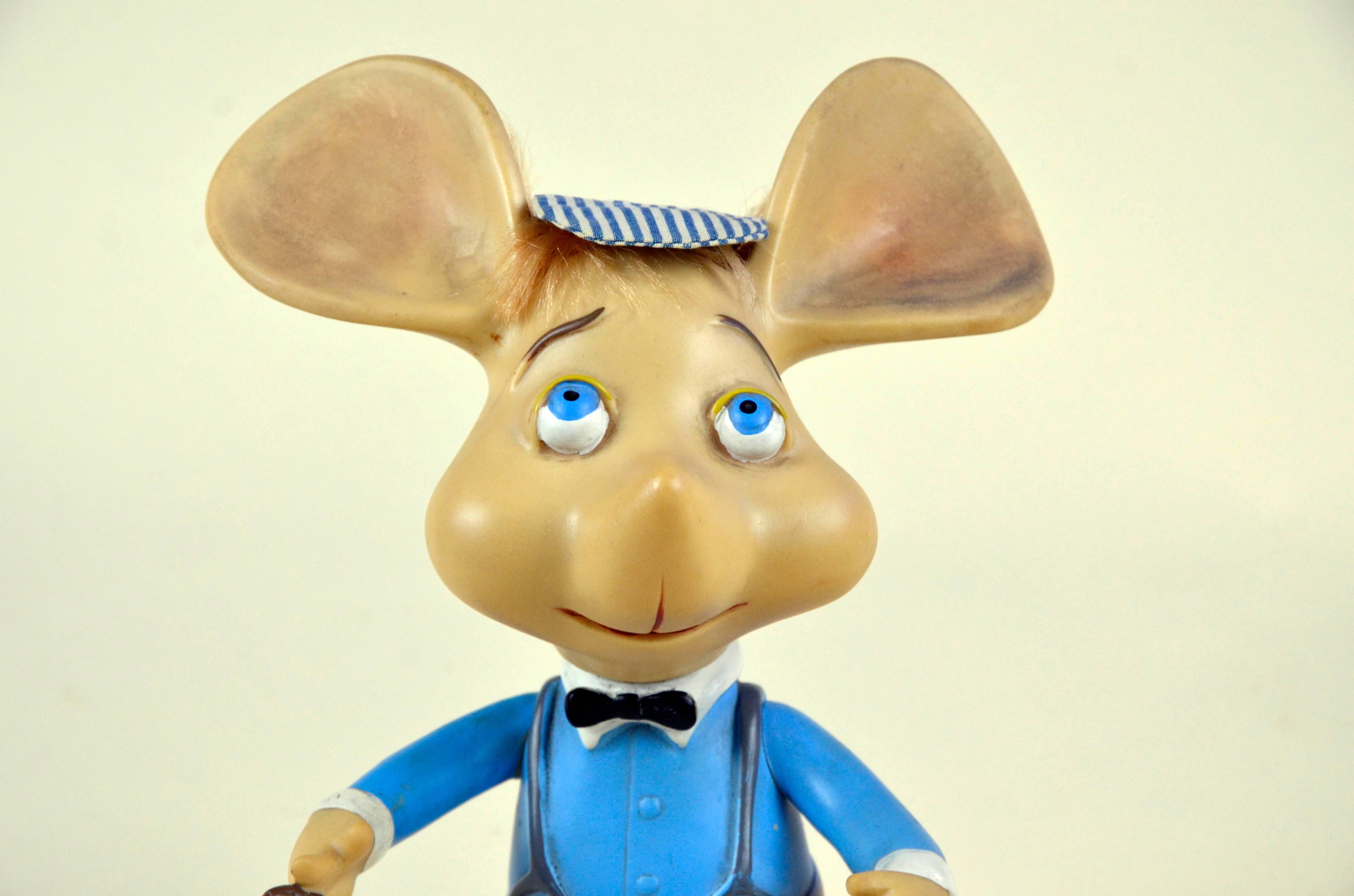 1960s iconic Topo Gigio mouse rubber toy made in Italy, designed by Maria Perego in 1958.

The toy has a fabric hat and movable arms.

Collector's note:

Topo Gigio Mouse was the lead character of a children's puppet show on Italian television in
