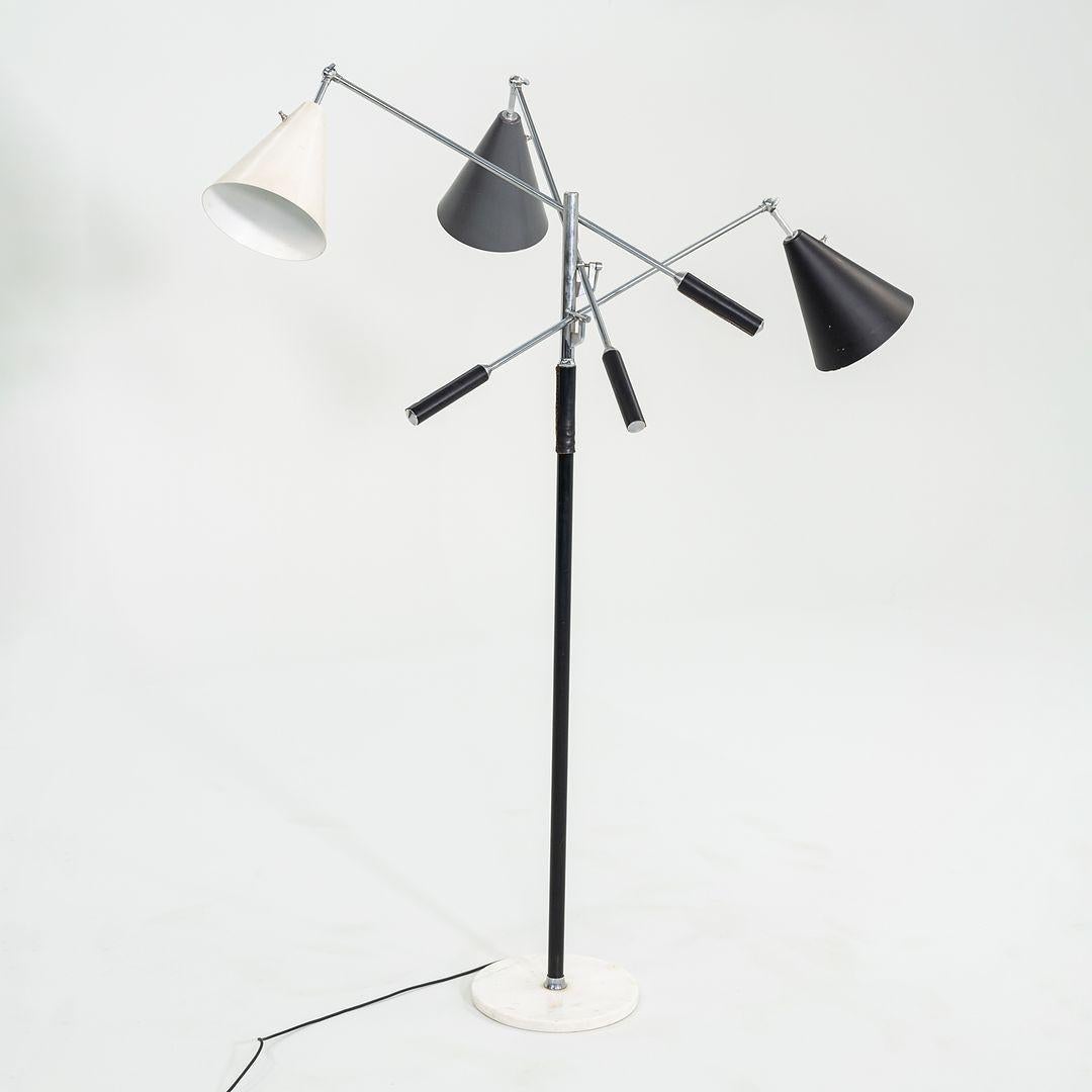 This is a 1960s 'Triennale' Floor Lamp, model 12128, attributed to Angelo Lelli for Arredoluce. The model '12128' drew its name from the Italian exhibition of the same name, making its debut in 1947. This example dates to the 1960s. It has three