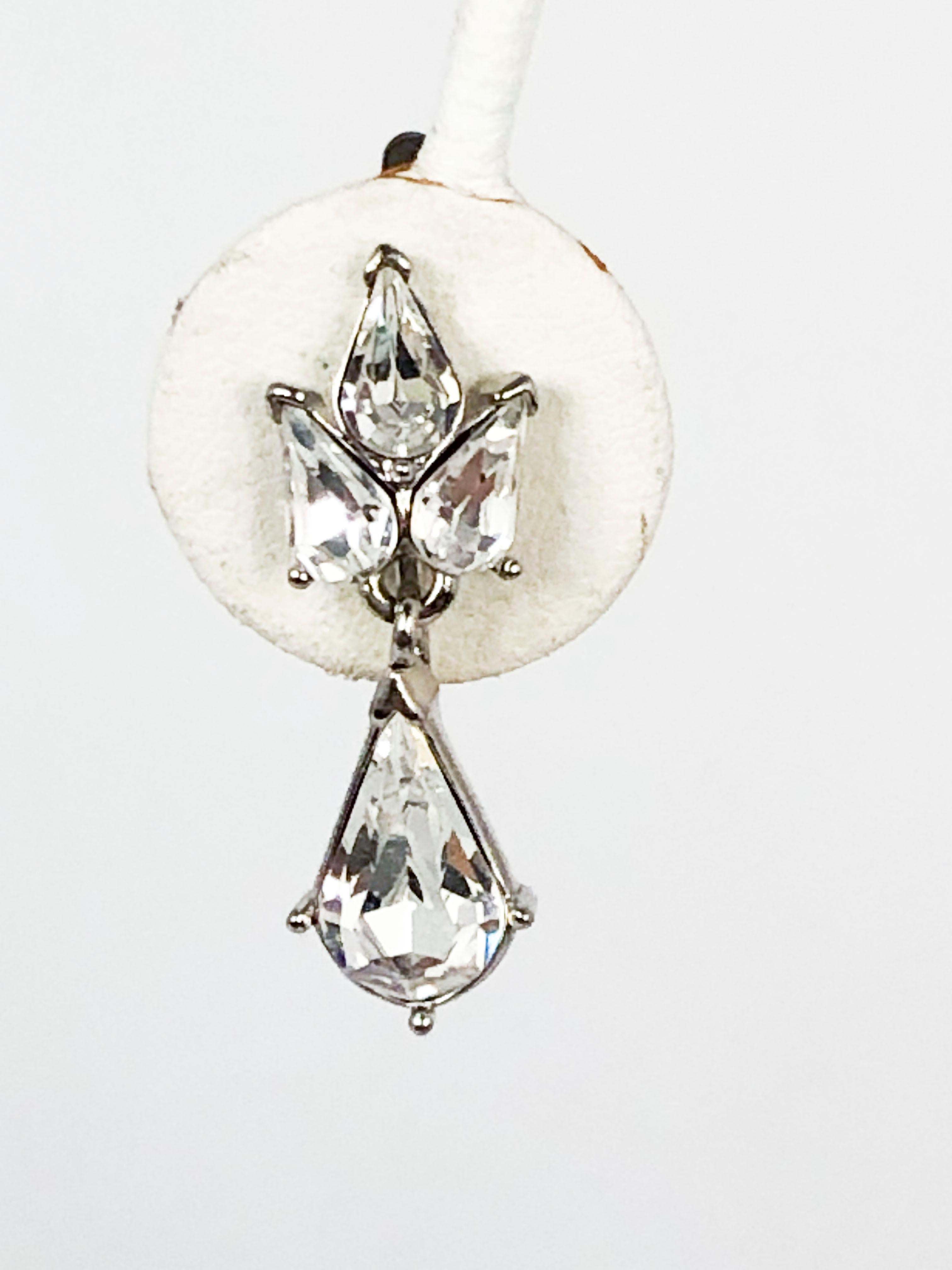 1960s clip-on earrings with large clear rhinestones with a 1/2 inch drop.