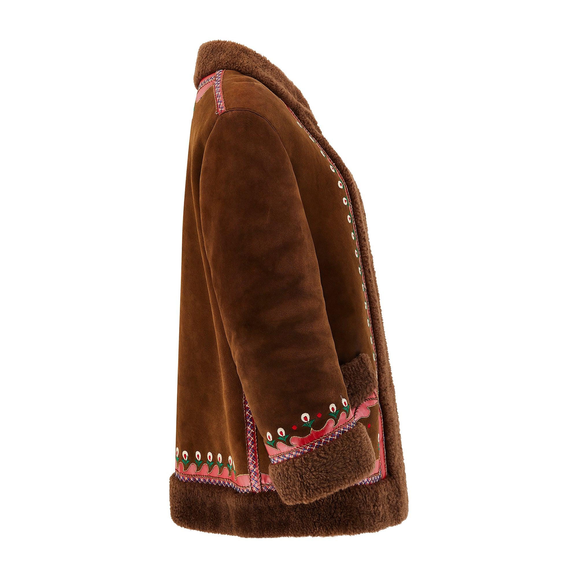 This original late 1960s to early 1970s Afghan leather and fur-lined coat is one of the best we've seen in over a decade. Afghan coats became the height of fashion in the 1960s hippie scene, worn by John Lennon, David Bowie and Jimi Hendrix. In
