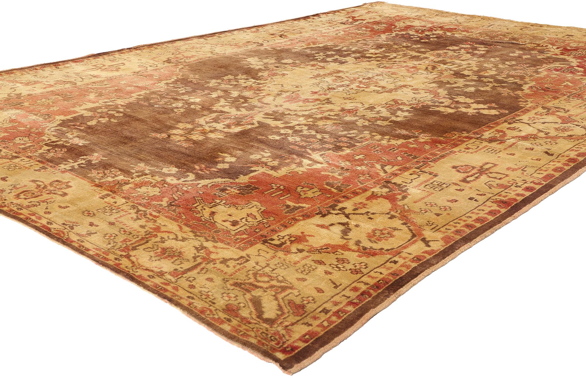 50561 Tappeto Vintage Turco Oushak, 07'00 x 10'01. Come toccato dal crepuscolo di una lontana memoria anatolica, questo tappeto vintage turco Oushak in lana annodato a mano risplende di una maestosità consumata dal tempo, ogni filo è un sussurro del
