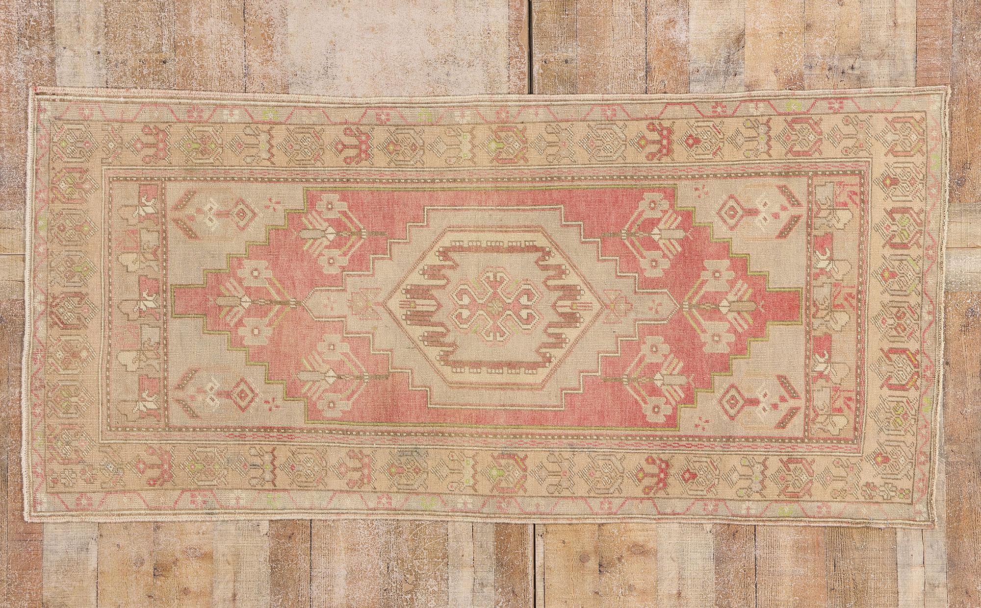 53999 Vintage Turkish Oushak Rug, 03'04 x 07'01. Rooted in the heart of Anatolia, this hand knotted wool vintage Turkish Oushak rug radiates with symbolic eloquence and timeworn splendor. At its center rests a commanding stepped hexagonal medallion,