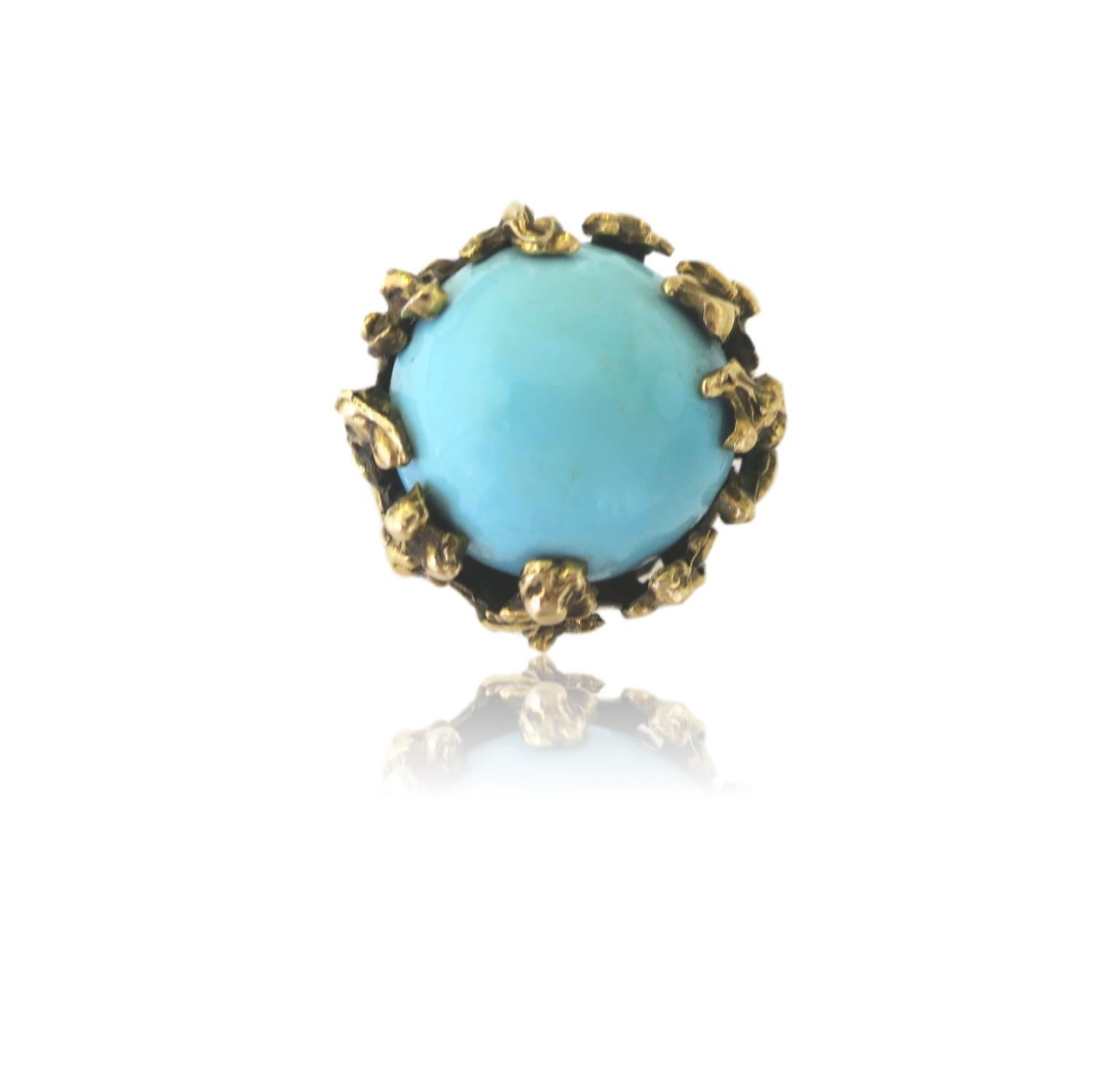 Handcrafted Turquoise and Gold ring. The 14K Yellow freeform ring with a gold brutalistic stylized foliage designed setting encasing a 7/8