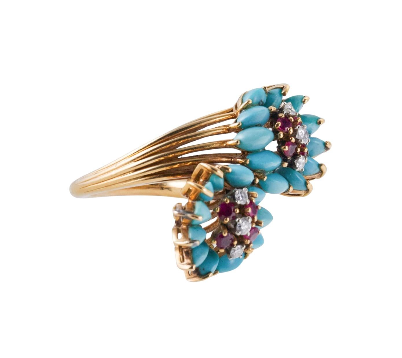 Vintage, circa 1960s 18k gold bypass cocktail ring, featuring vibrant colors of turquoise and rubies, with approx. 0.14ctw in diamonds. Ring size 6, top is 20mm x 32mm. Weight of the piece - 14 grams. 