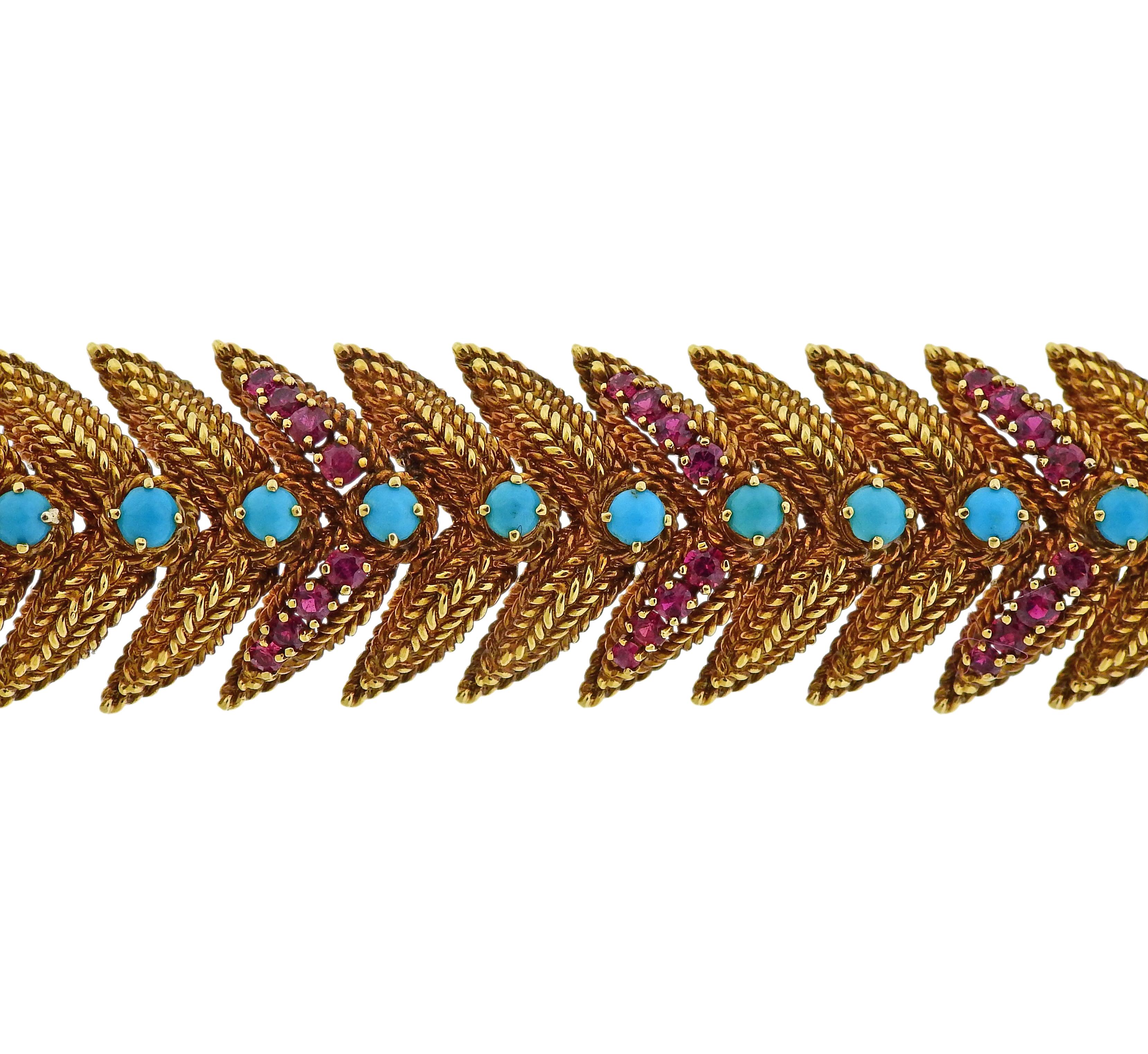 Vintage circa 1960s 18k gold leaf motif bracelet, set with turquoise and rubies. The bracelet is 7.25