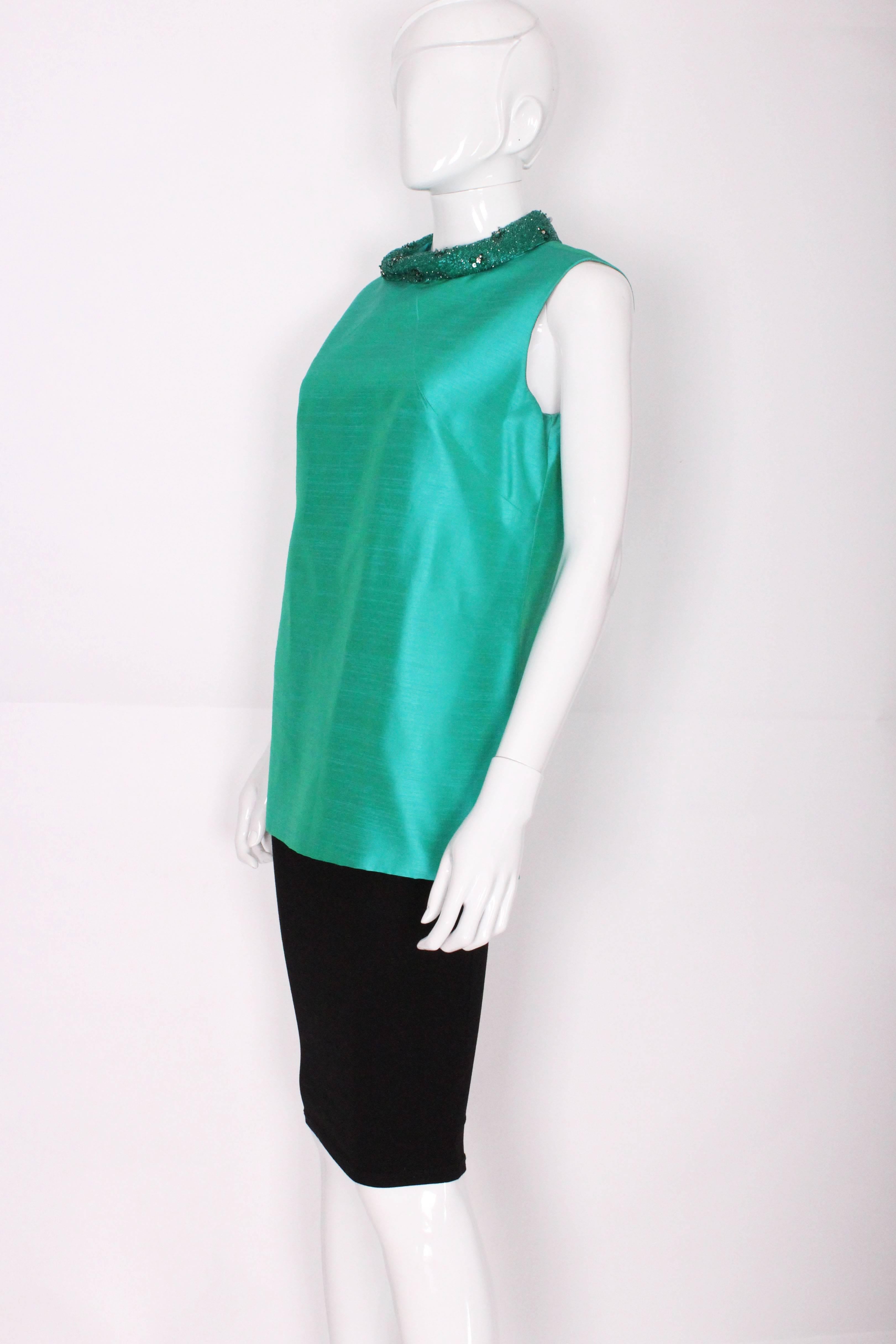 turquoise silk blouse
