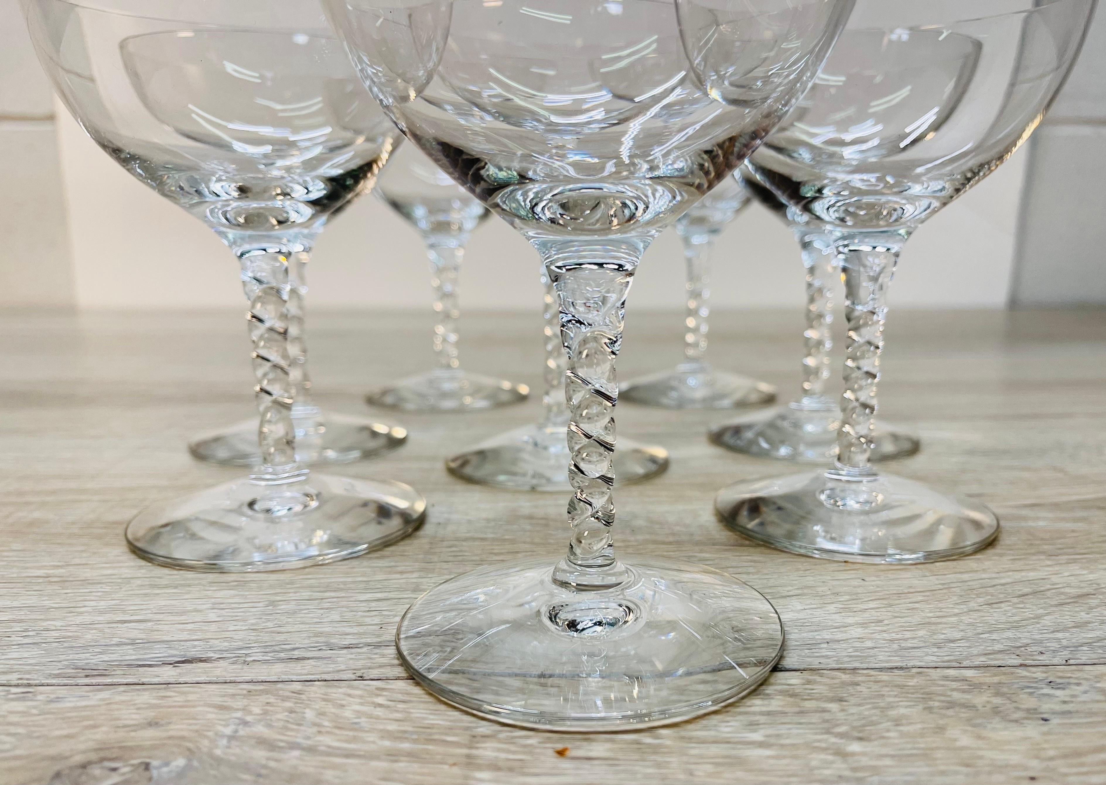 Vintage 1960s set of 8 twisted glass stem champagne coupes. No marks.
