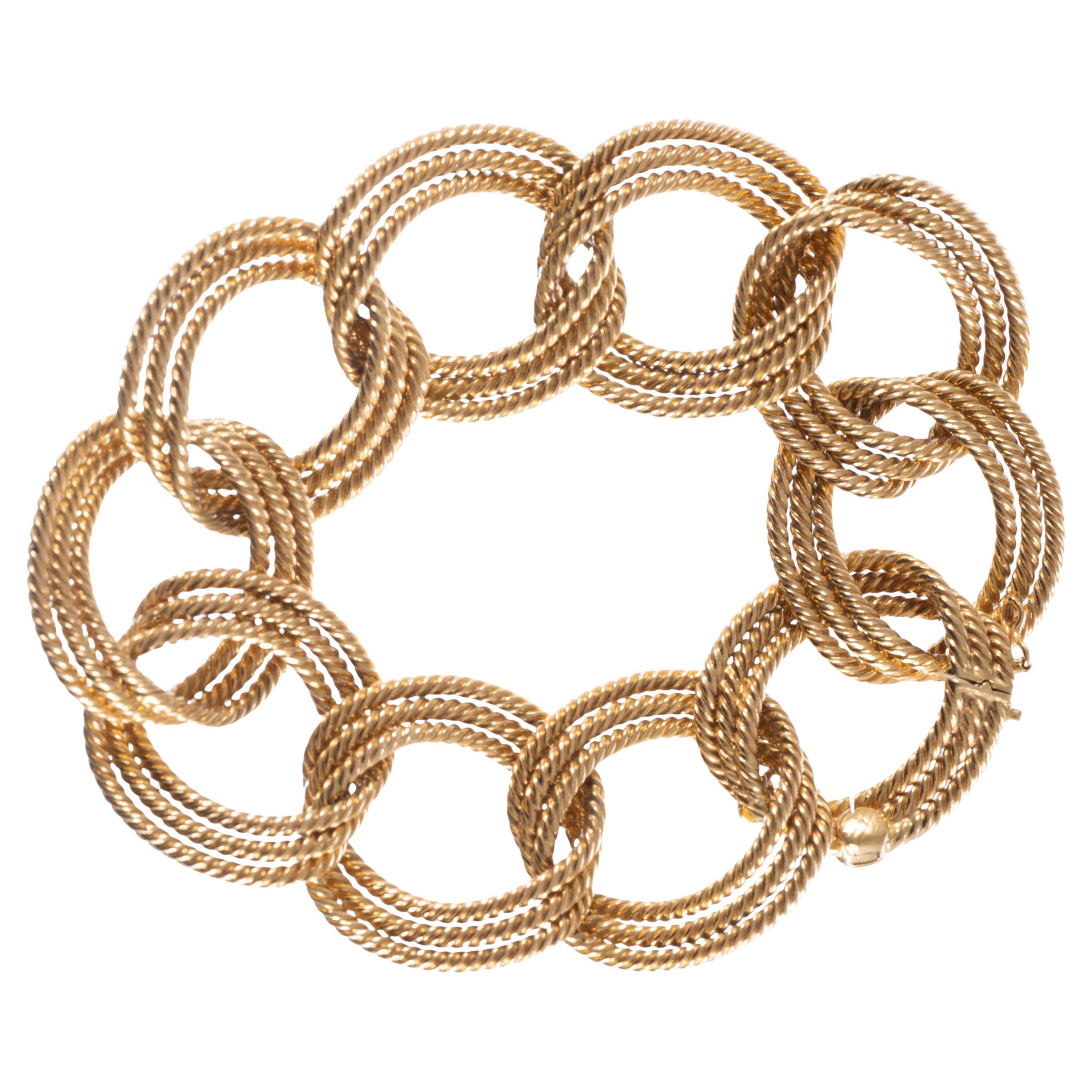 Bracelet stylisé en or jaune 18k des années 1960 avec fils torsadés et cercles concentriques Excellent état - En vente à Carmel-by-the-Sea, CA