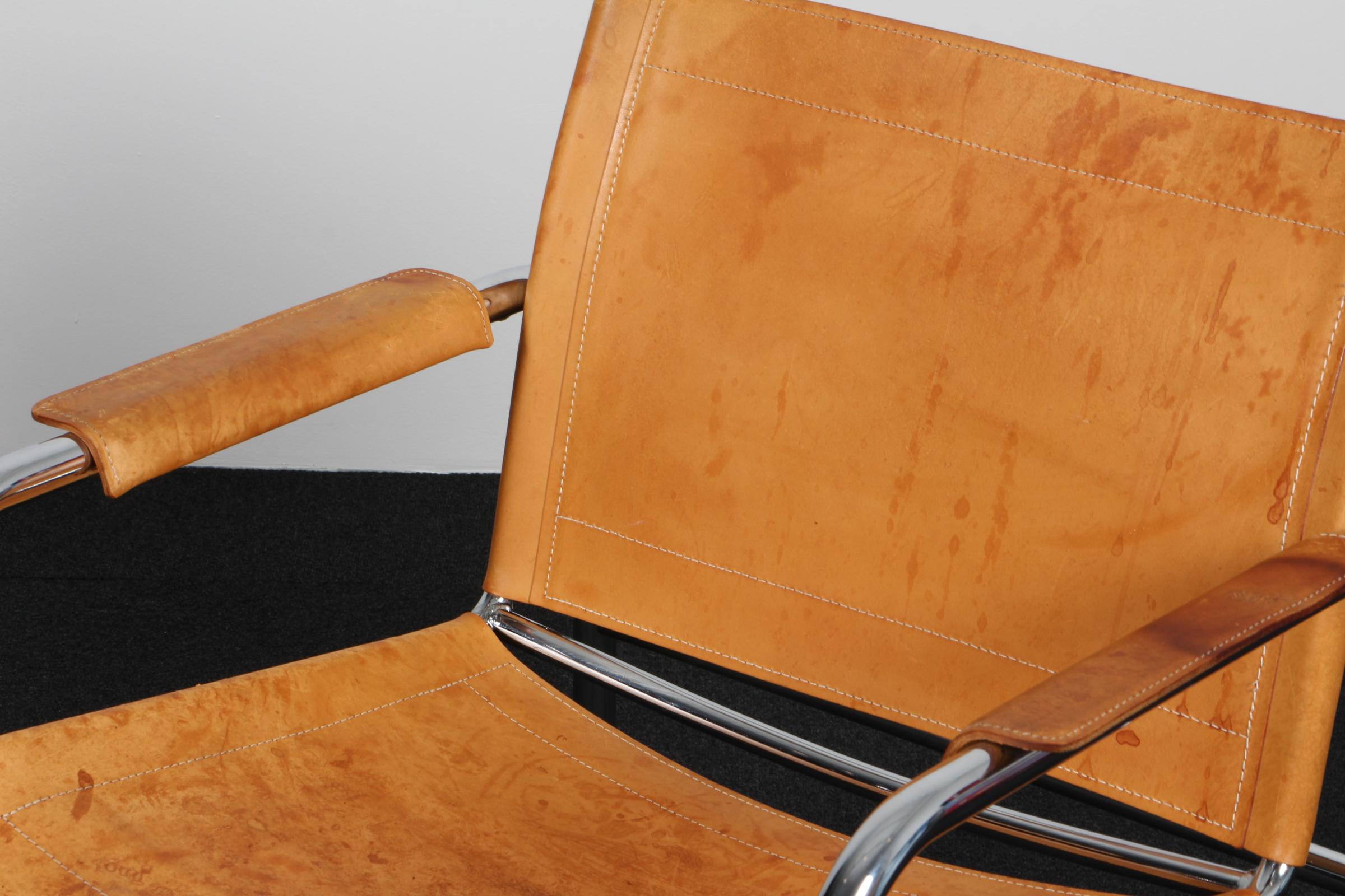 Scandinavian Modern 1960s , Two Leather and Tubular Steel Arm Chair 'Klinte' by Tord Björklund For Sale