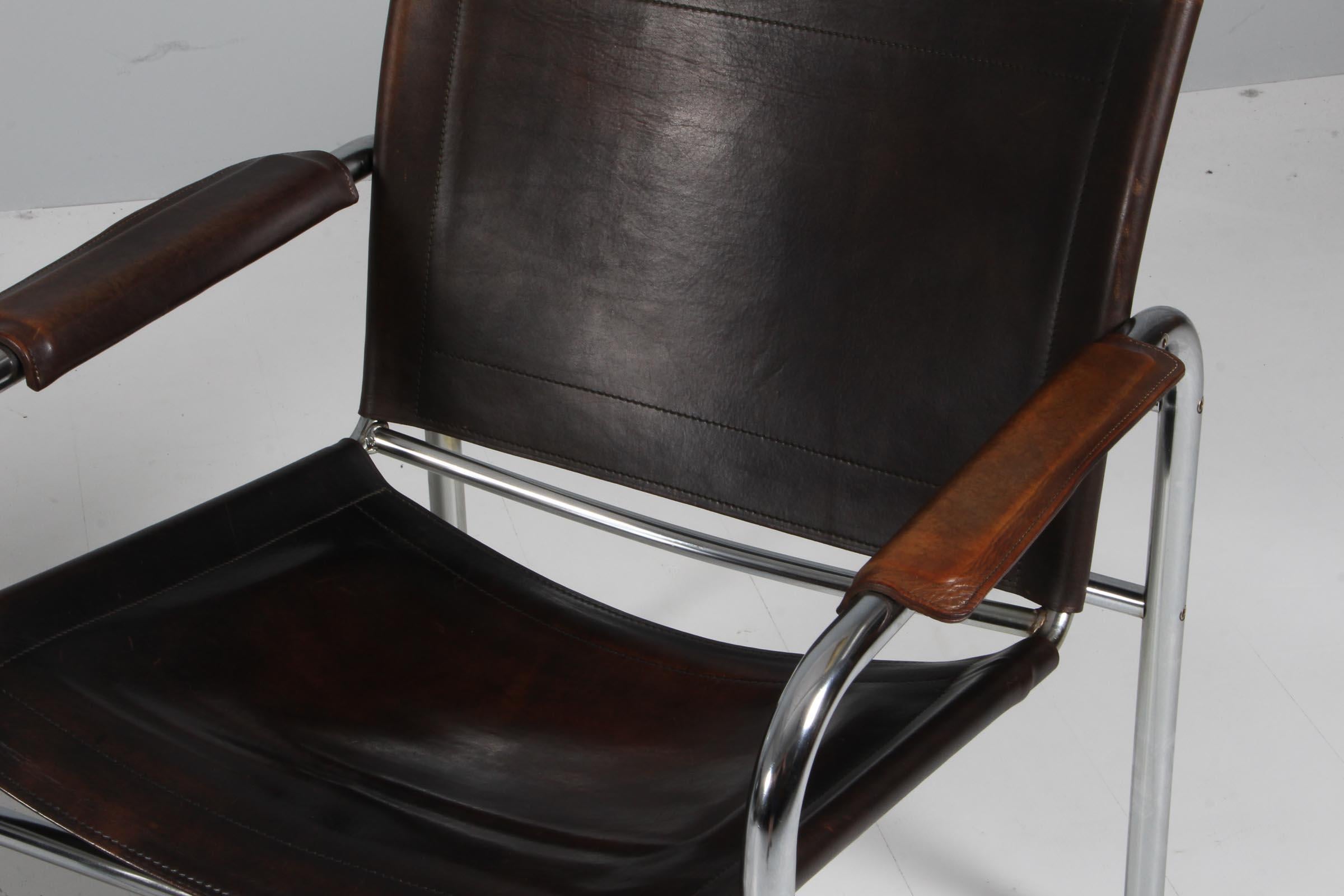 Scandinavian Modern 1960s , Two Leather and Tubular Steel Arm Chairs 'Klinte' by Tord Björklund For Sale