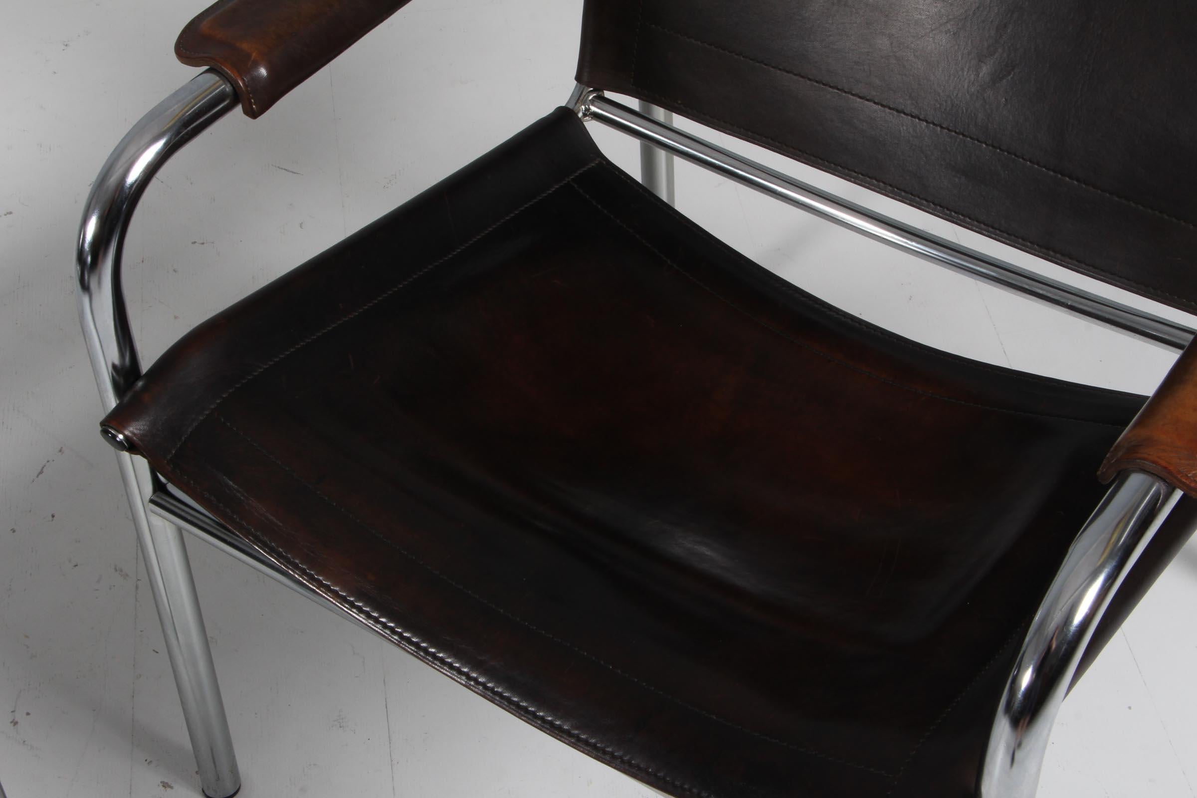Swedish 1960s , Two Leather and Tubular Steel Arm Chairs 'Klinte' by Tord Björklund For Sale