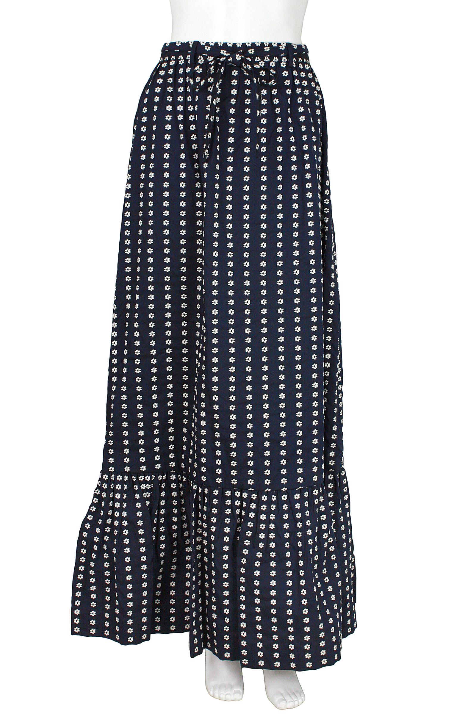 Valentino maxi skirt 
Rayon navy with embroidered white flowers 
Flounced panel at hem 
Tie rayon belt 
Back zipper and hook and eye 