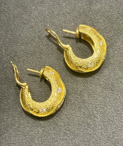 1960s Van Cleef & Arpels 18k gold and diamond hoop earrings