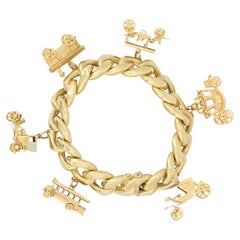 1960s 14 Karat Yellow Gold Wide Charm Bracelet with Rope Edge For Sale at  1stDibs
