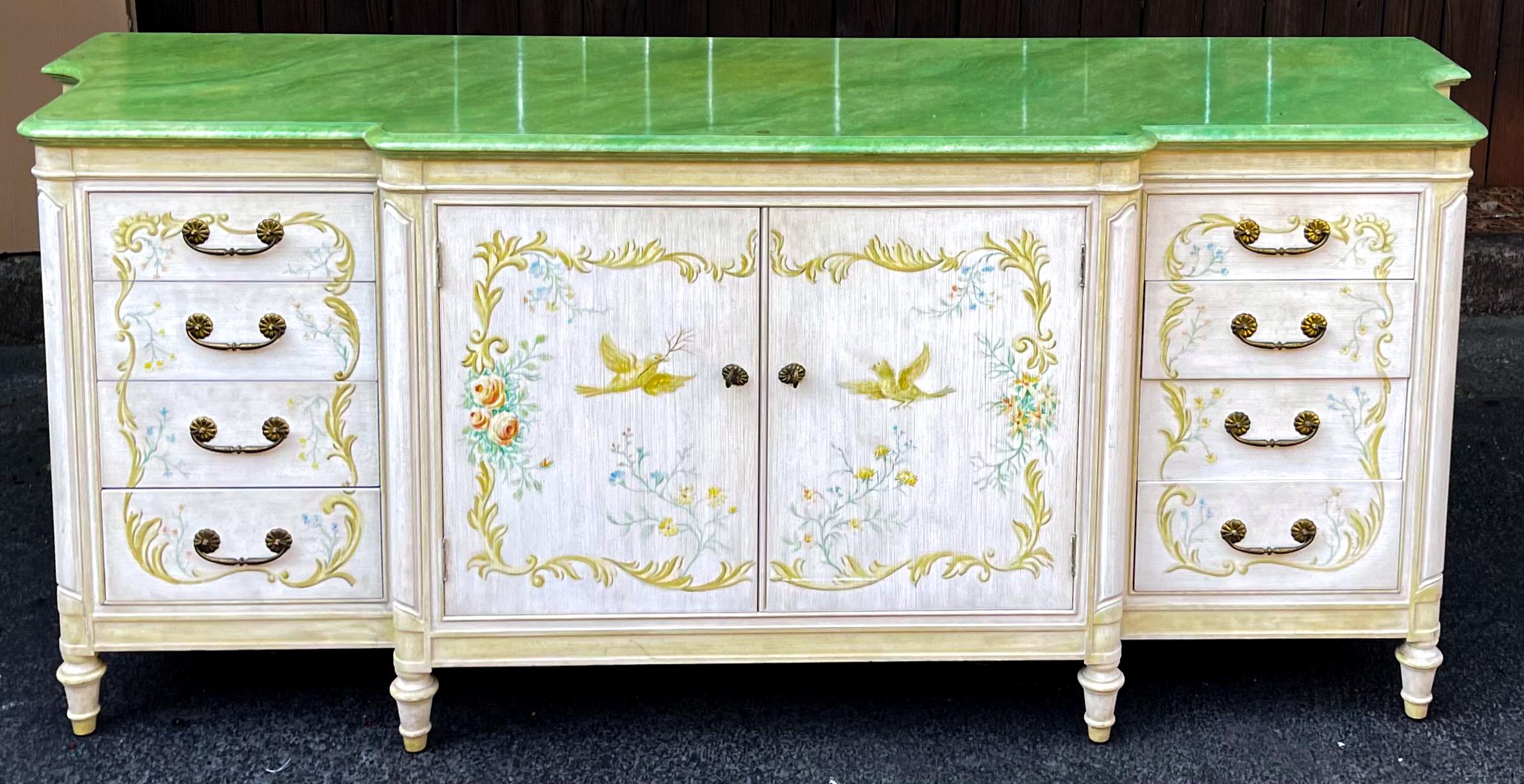 This is a large scale Venetian style hand painted cabinet with faux marble top. A versatile piece! It could work from sideboard to bath to foyer to changing table! It is unmarked and dates to the 60s.

My shipping is Continental US only.