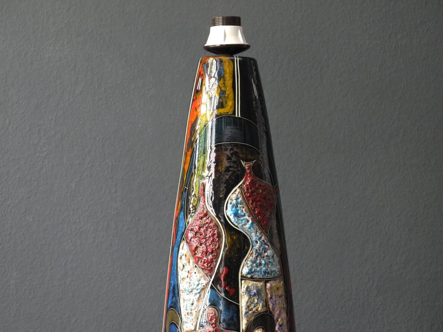 Handmade 1960s very nice huge colorful ceramic table or floor lamp.
Made by Melior. Made in Italy. Very nice rare design elaborately hand-painted and with the front side in lava design.
Can be used as a table lamp or as a floor lamp. Sale and