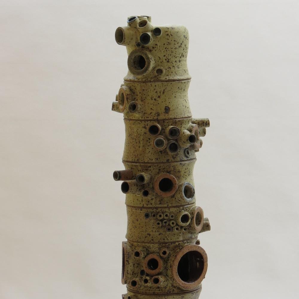 A very large and impressive one-off Studio Pottery sculpture.

Hand produced earthenware sections that interlock to form a tower. Each section has been hand thrown, glazed and fired.

This piece was produced in 1968 by Jean Dovey, a student at