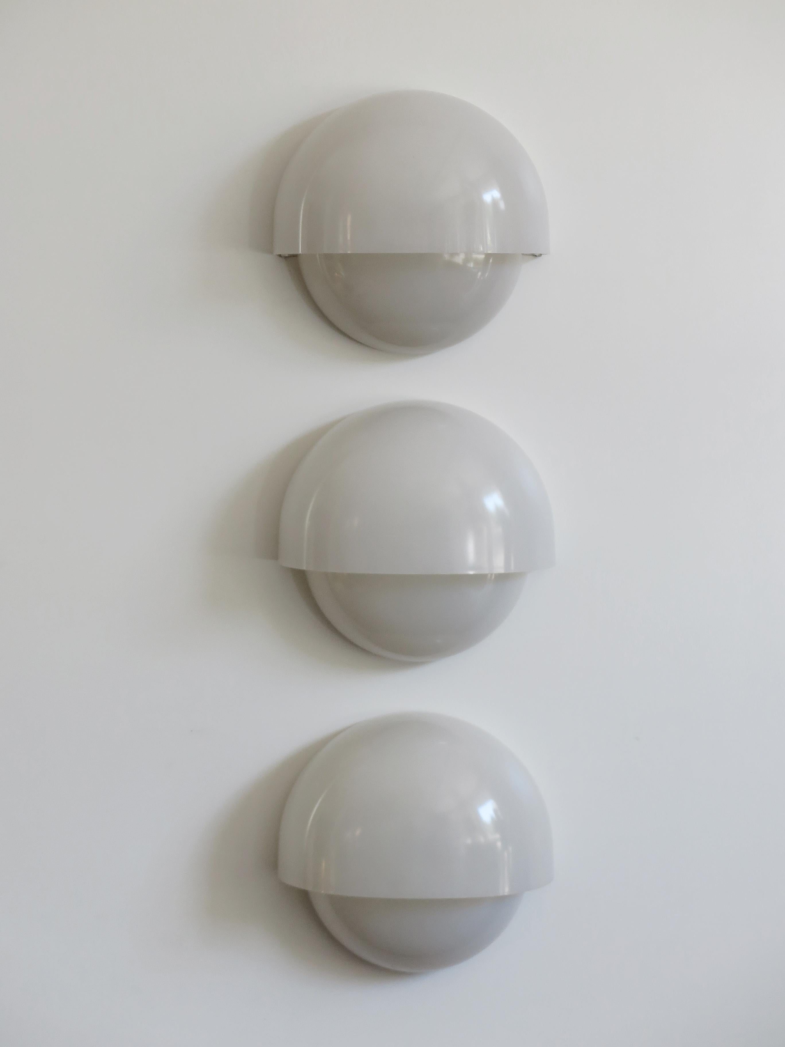 1960s three polycarbonate sconces or wall lamps model 