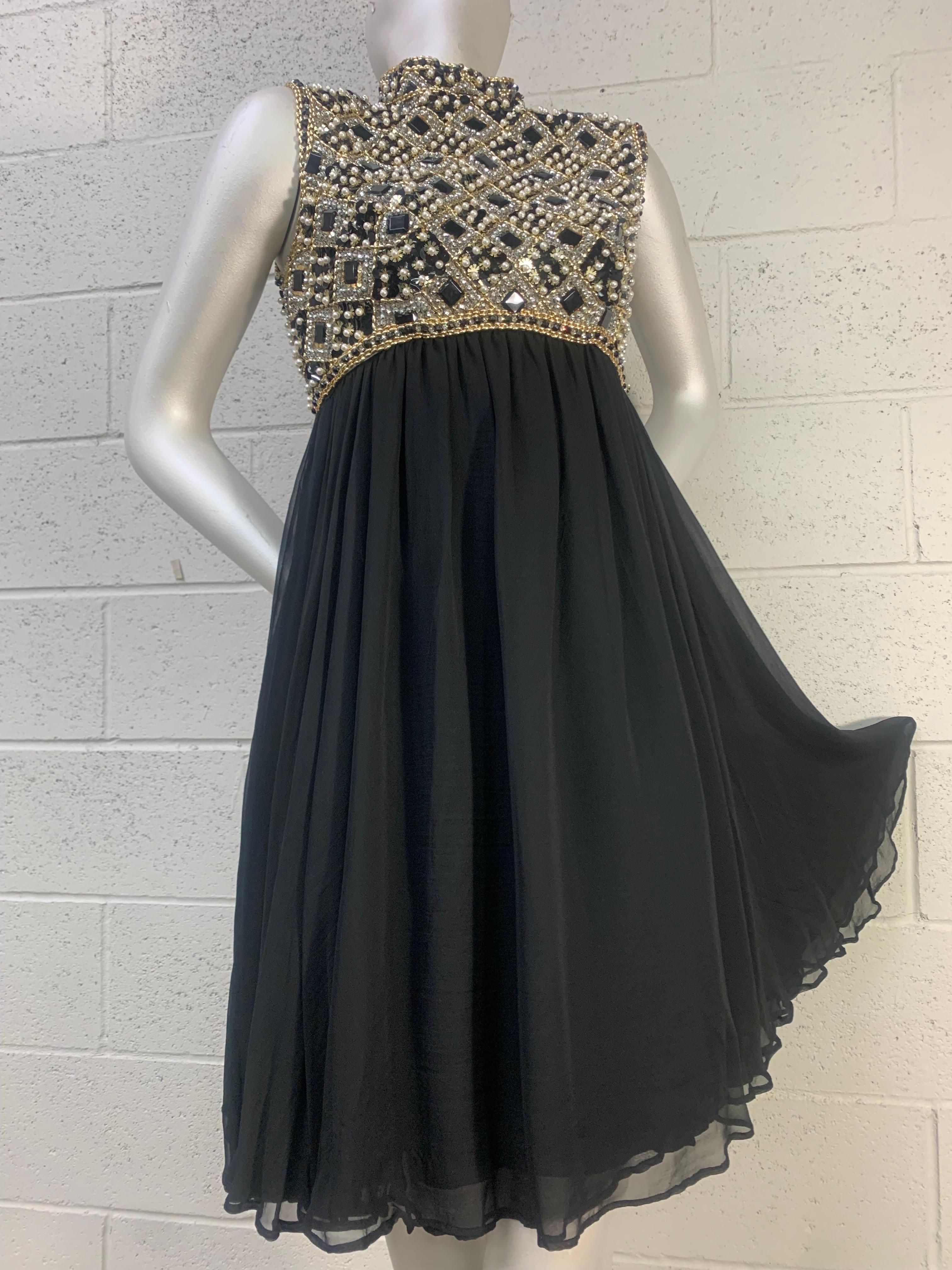 1960s Victoria Royale Ltd. Beaded Sequined Mod Cocktail Dress in Black:  Empire waistline. Bodice is heavily beaded with a banded neckline. Double layer silk chiffon full skirt. Center back zipper. Fully lined. US size up to a modern 8.