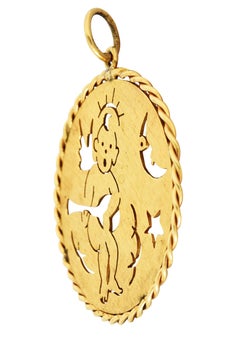 Pendentif médaillon étoilé vintage en or jaune 14 carats avec médaillon en forme d'ange céleste, années 1960