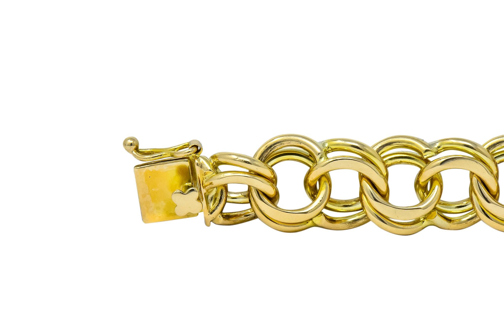 Contemporary 1960s Vintage 14 Karat Yellow Gold Curbed Link Unisex Charm Bracelet
