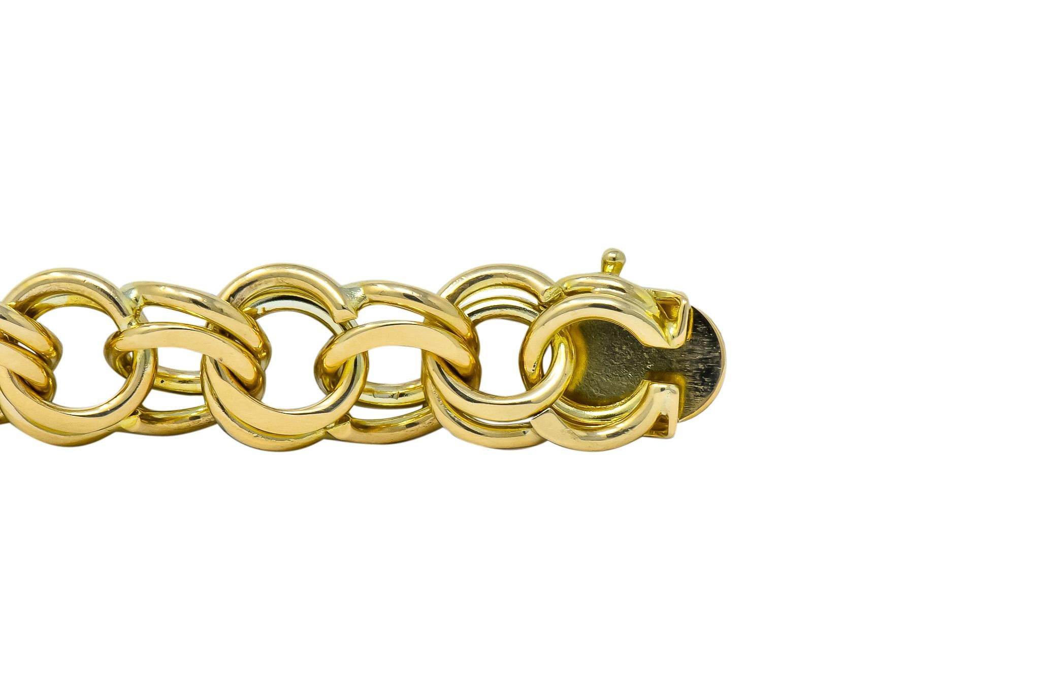 1960s Vintage 14 Karat Yellow Gold Curbed Link Unisex Charm Bracelet In Excellent Condition In Philadelphia, PA