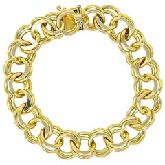 1960s Vintage 14 Karat Yellow Gold Curbed Link Unisex Charm Bracelet