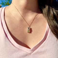 Vintage 1960s 14K Yellow Gold Articulating Car Charm with Enamel Details