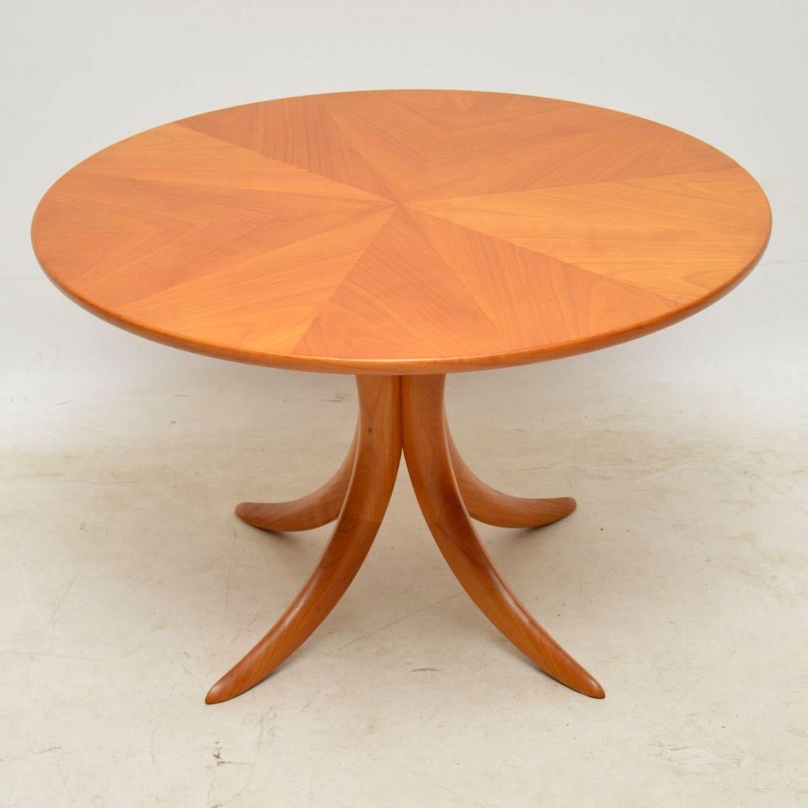 A beautiful vintage coffee table of stunning quality, this was made in Germany by Alma, it dates from the 1960s. It has wonderfully shaped sabre legs in solid teak, the top looks like elm or ashwood. It’s in great vintage condition, there are just a