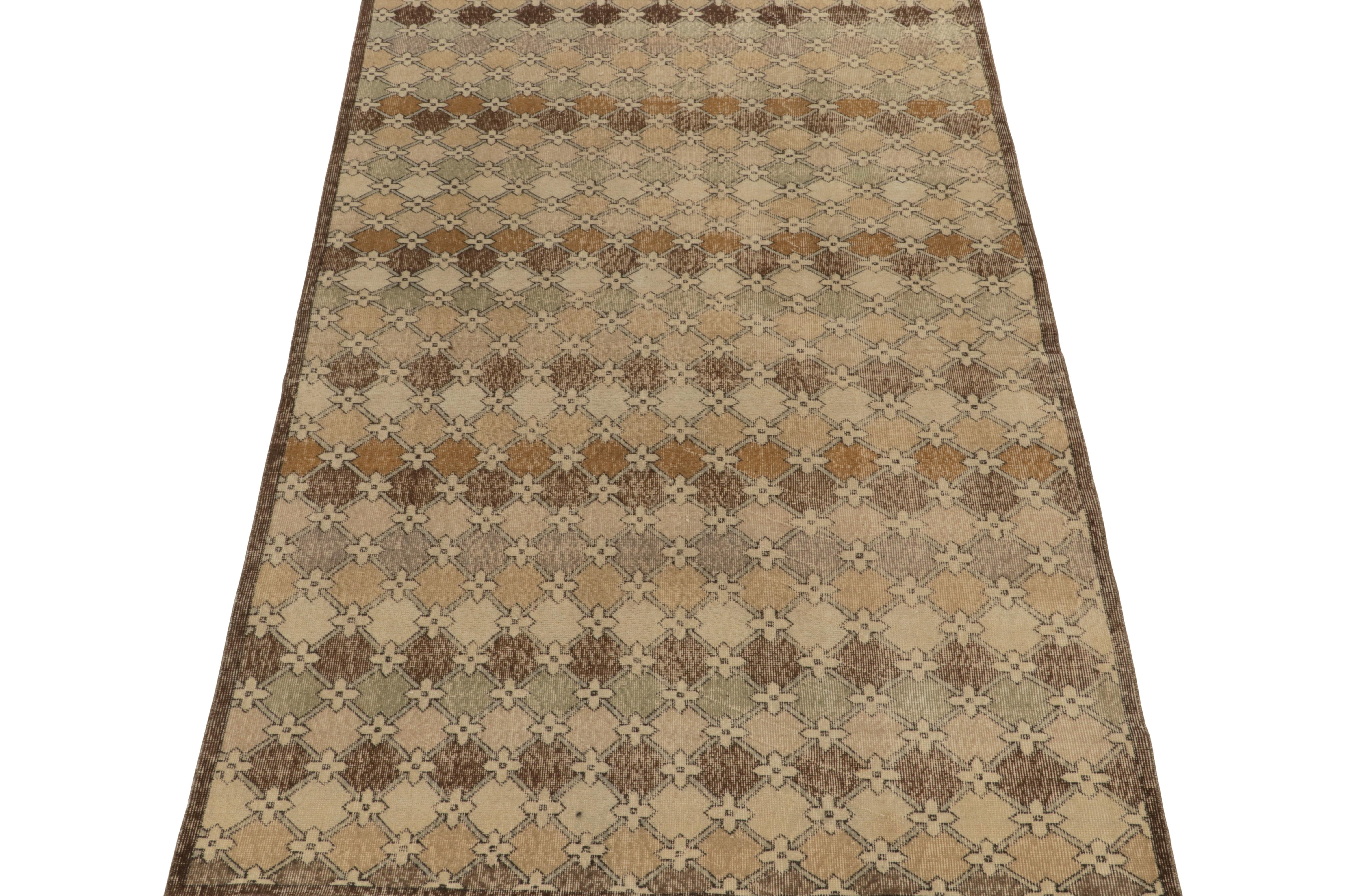 A 6x9 vintage rug exemplifying rare Turkish art deco sensibilities, among the latest to join our Mid Century Pasha Collection. 

Curated from an innovative Turkish designer, this 1960s piece features a smart geometric pattern in earthy beige,