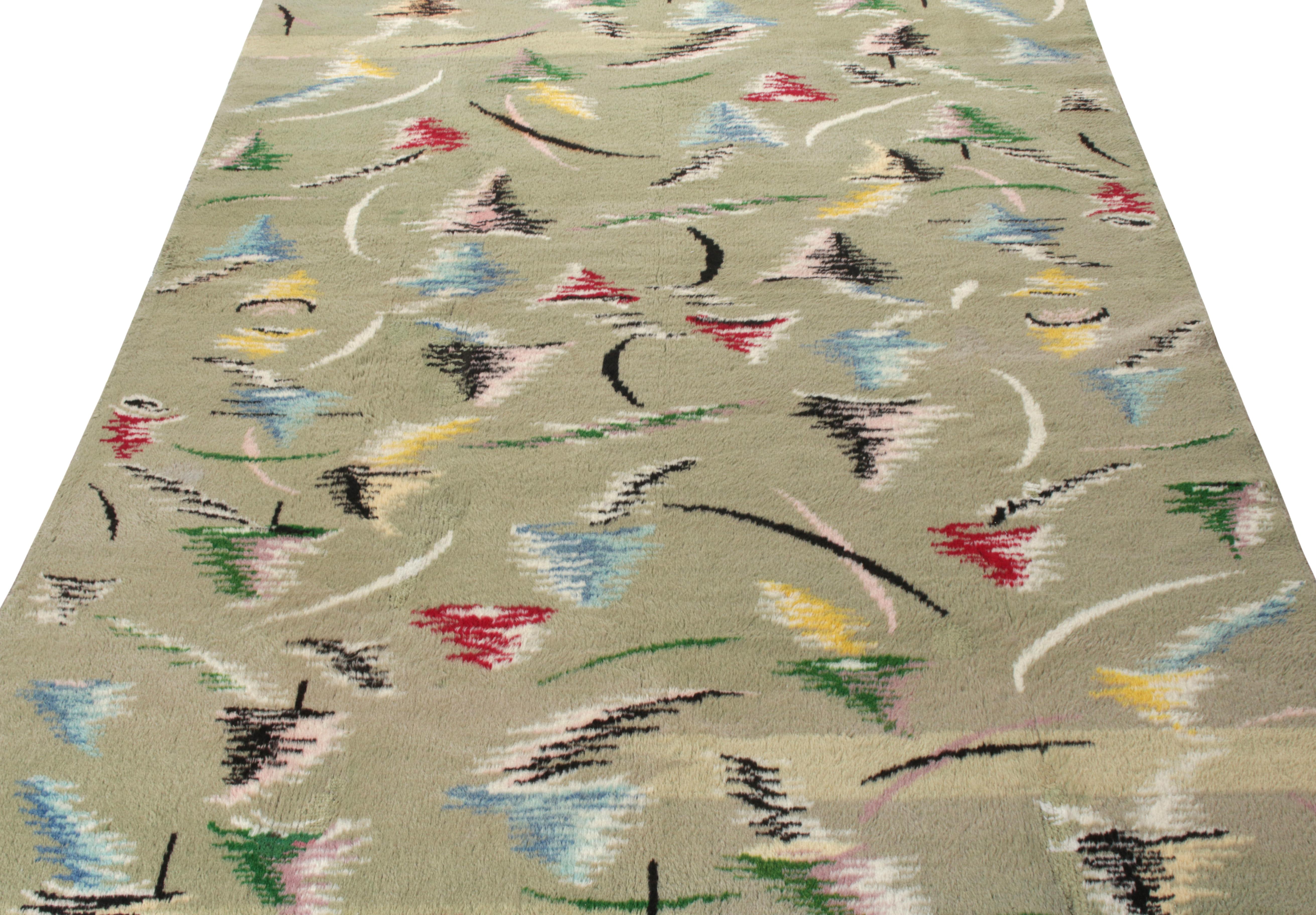 Hand-knotted in wool, a vintage 6x10 Art Deco rug selection from Turkish designer Zeki Muren, entering Rug & Kilim’s commemorative Mid-Century Pasha Collection. The mature, yet playful mid-century modern piece revels in a thoughtful pale green