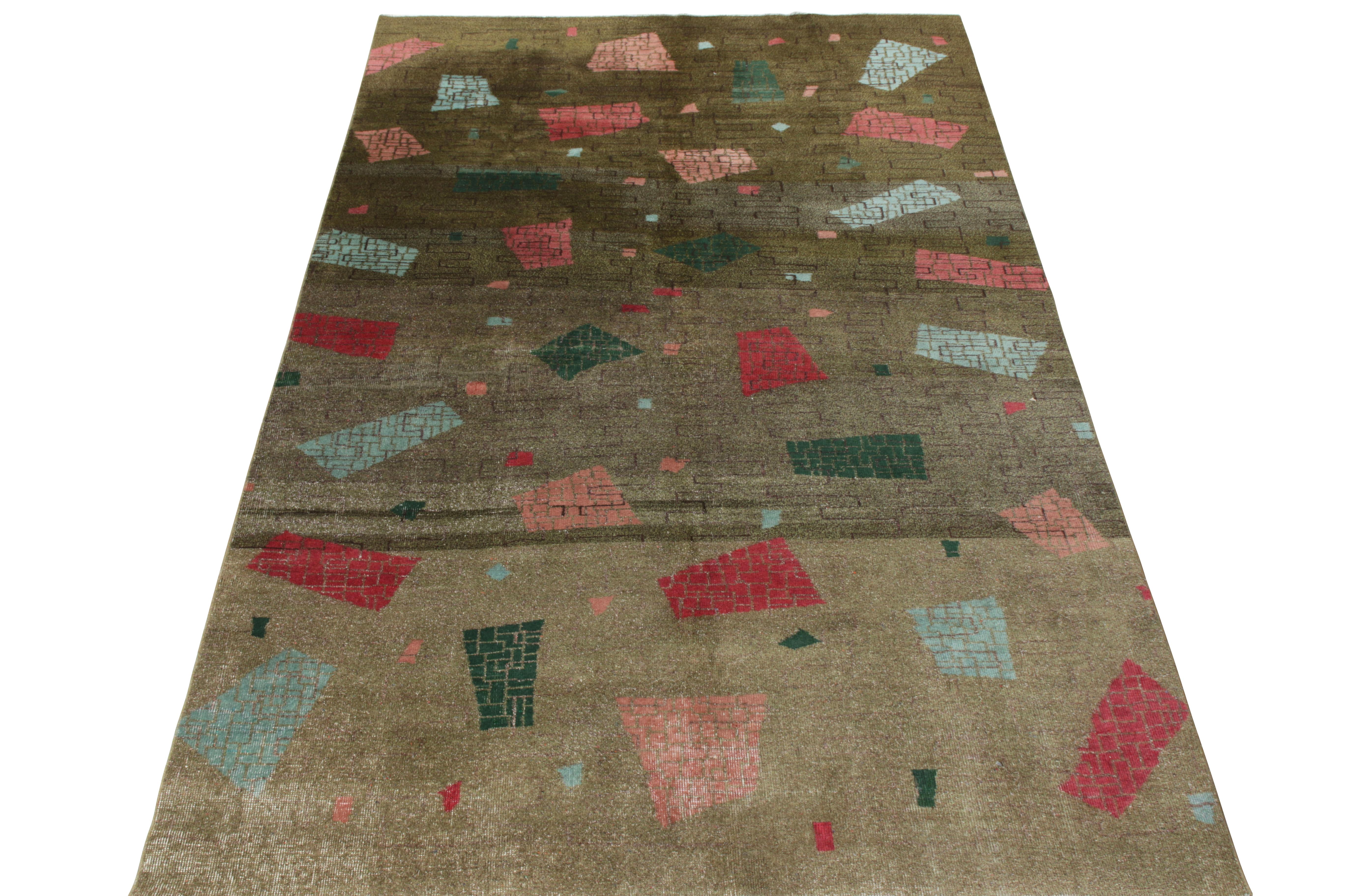 Hand-knotted in wool, this 6x10 vintage Turkish Deco rug piece joins Rug & Kilim’s Mid-Century Pasha collection. This repertoire features the iconic works of the legendary designer Zeki Muren that showcases his wholehearted love for the 1960s style