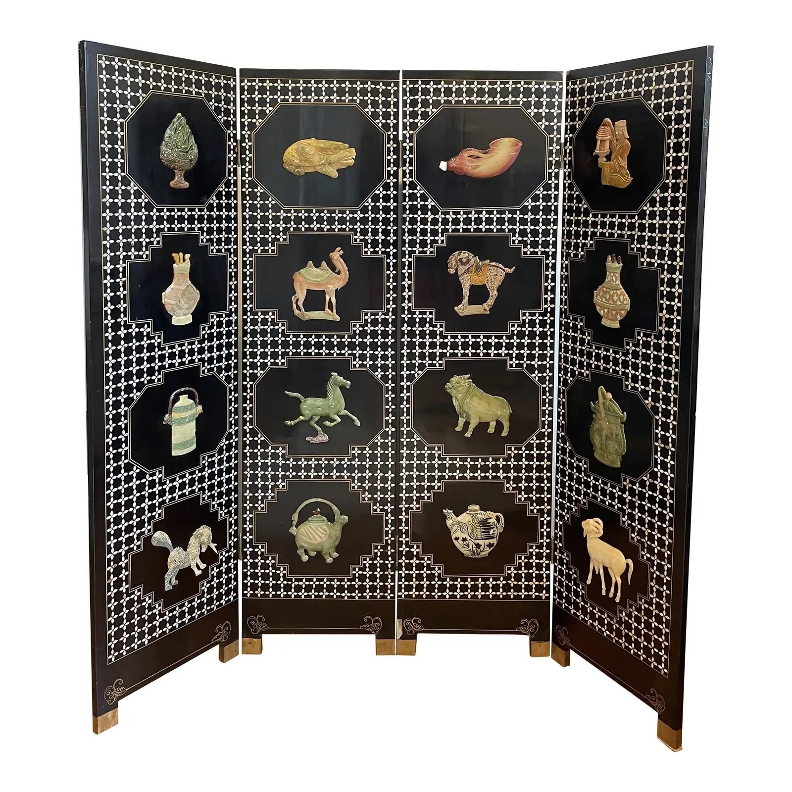 Rare Asian, four panel, free standing room divider screen featuring carved jade motifs and mother of pearl inlay. In good vintage condition, with some crazing and minor chips were the panel's folds. The dimensions are 60