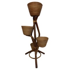 1960s vintage bamboo and rattan flower stand from Italy