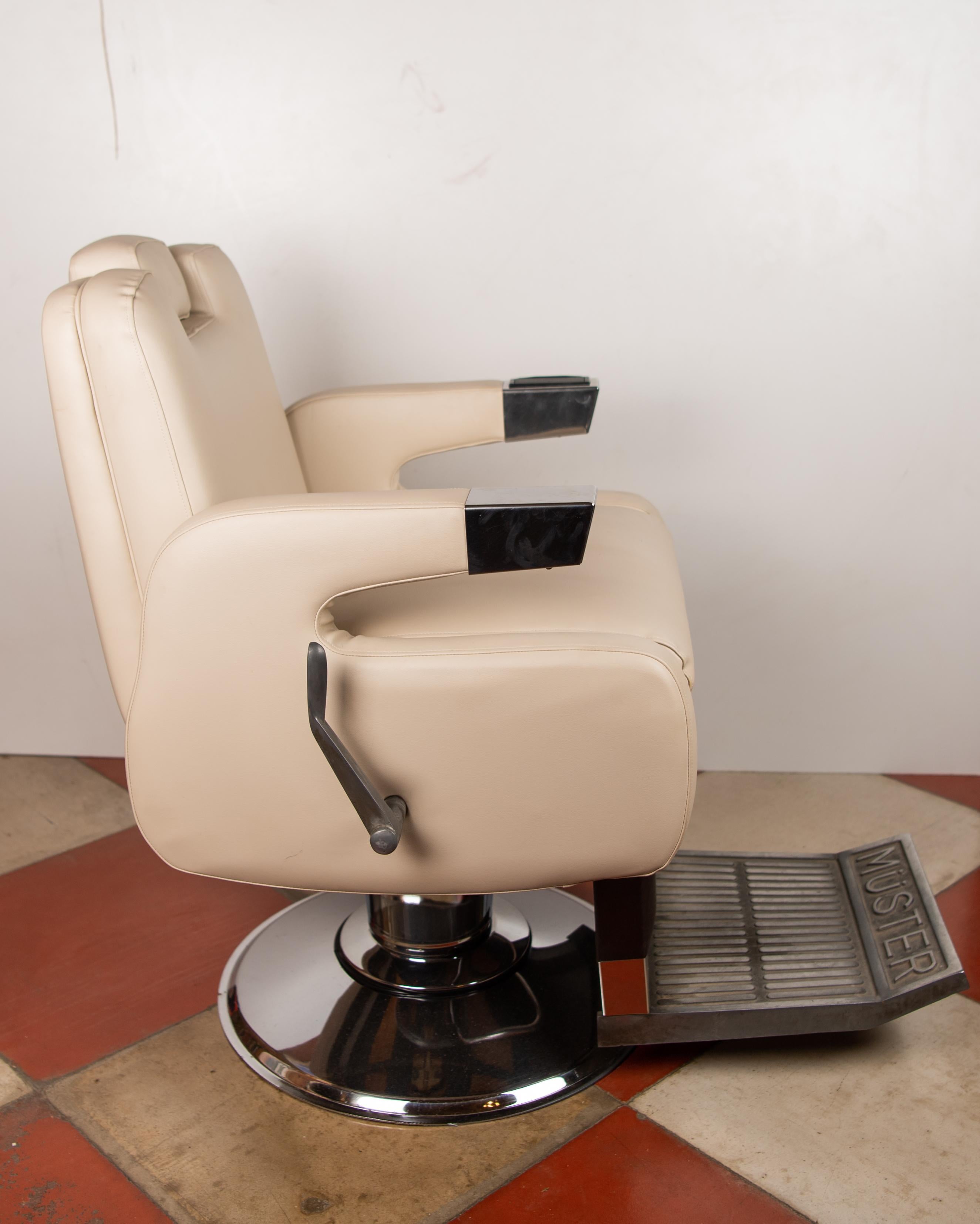 Very rare barber adjustable armchair with beige and brown faux leather cover and steel and chromed structure. Item has been restored with brand new leatherette cover, and cleaned and polished chroemd parts. Typical barber shop item from the 1960s