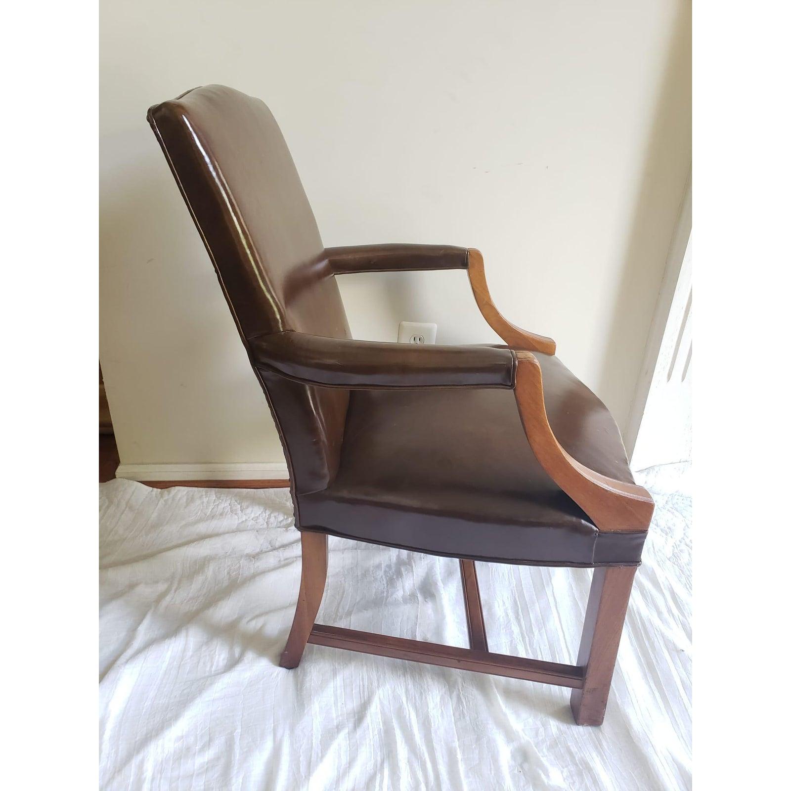 Pair of 1969 Barrit Furniture Directoire / English Georgian style leather arm chairs. Top grain leather has been very well care of and great condition. Back nail trims. Chair measures 25