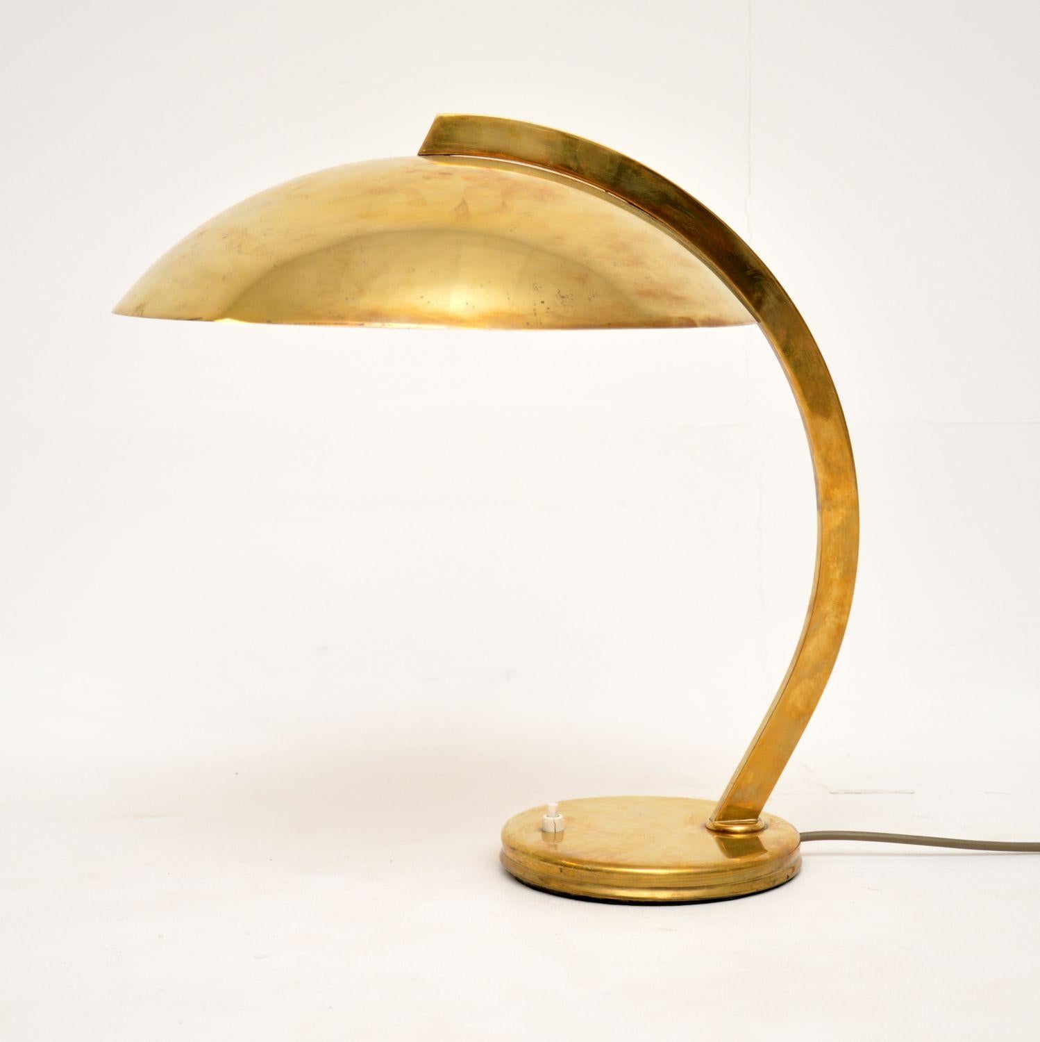 A very stylish and extremely well made vintage brass desk lamp. It is in the Bauhaus style, this was made in Germany by Egon Hillebrand, it dates from the 1950’s.

The quality is amazing, the brass frame has a lovely patina and this has a gorgeous