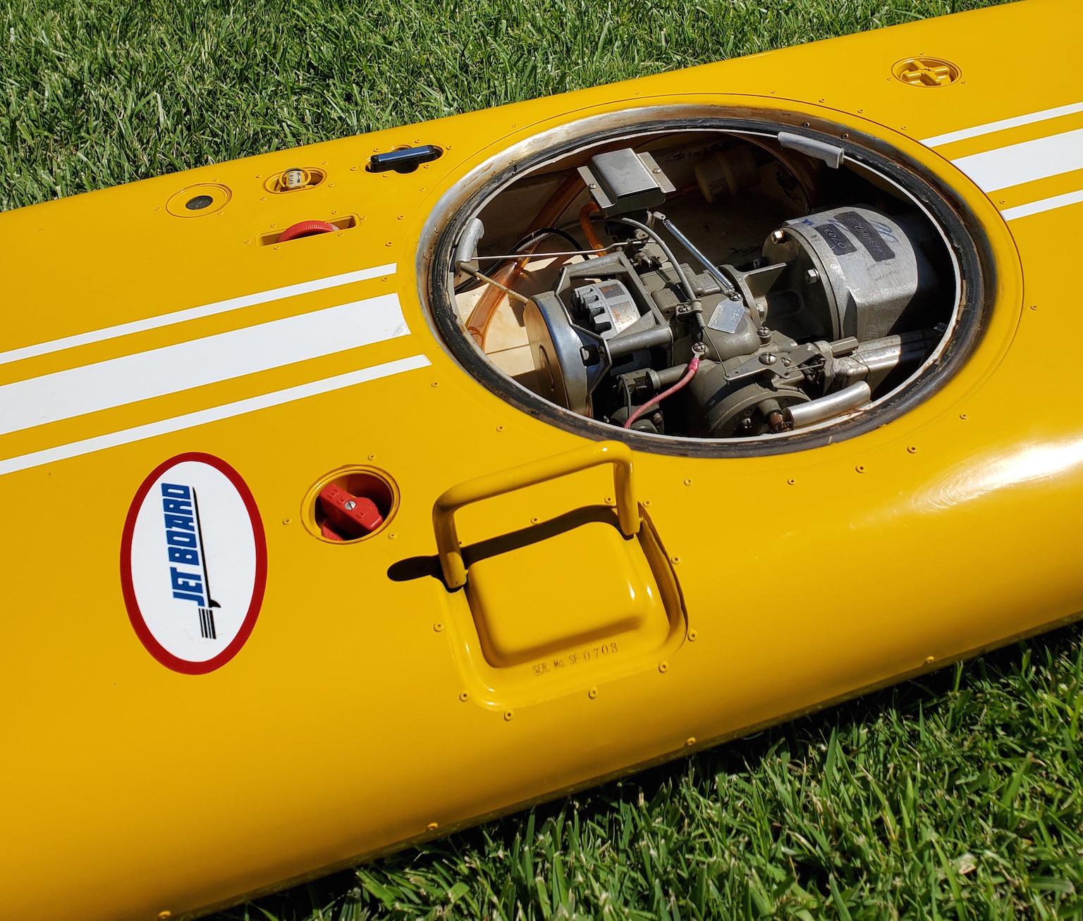 vintage motorized surfboard
