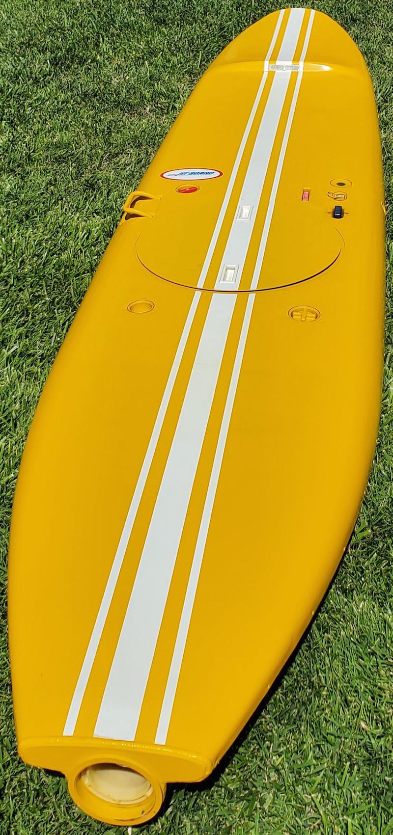 Vintage motorized surfboard on sale
