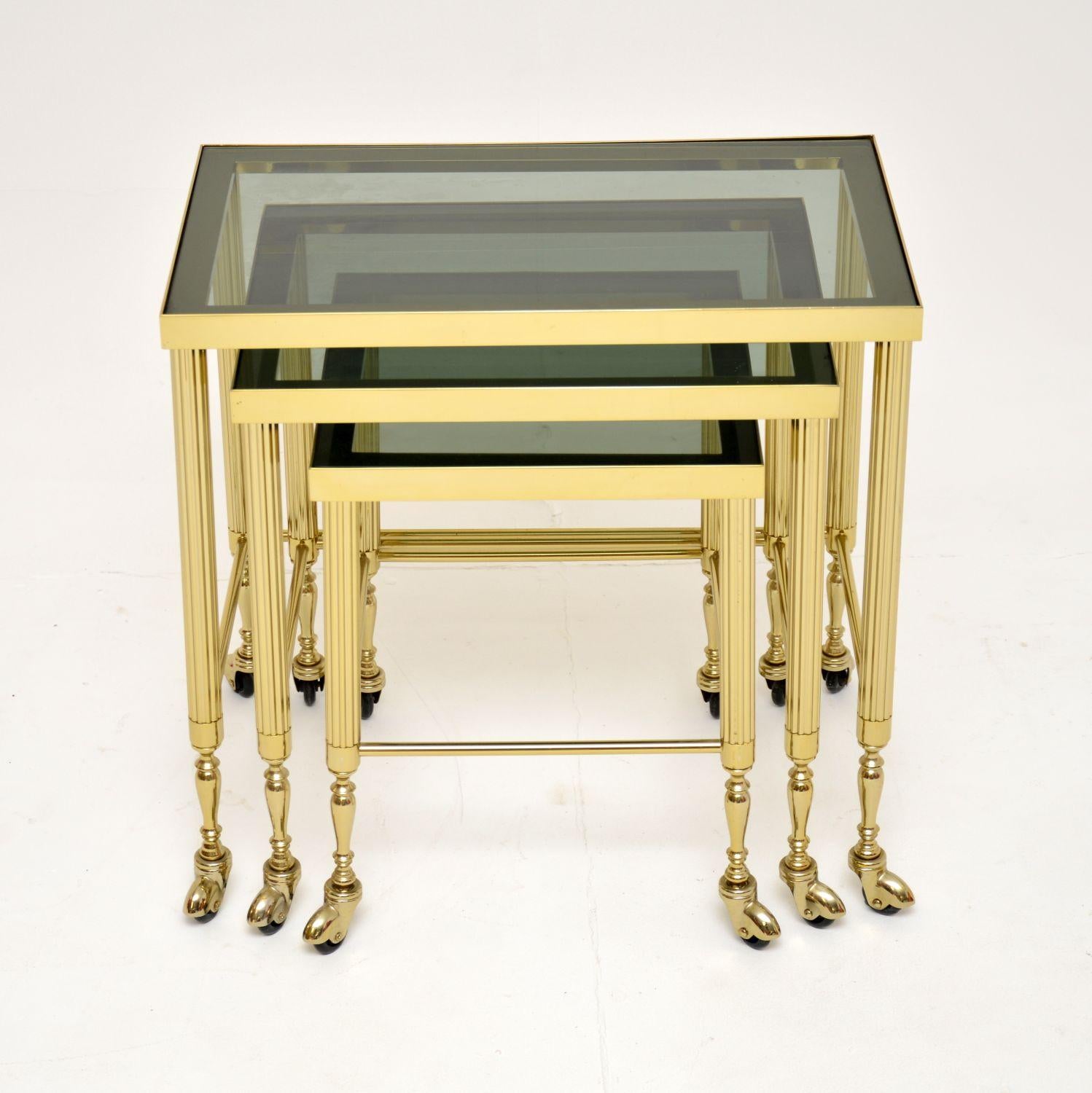 A stunning set of three vintage nesting tables in solid brass. They were made in France, and date from around the 1960’s.

They are a very useful size, the quality is great and they are in excellent condition for their age.

Each table rolls