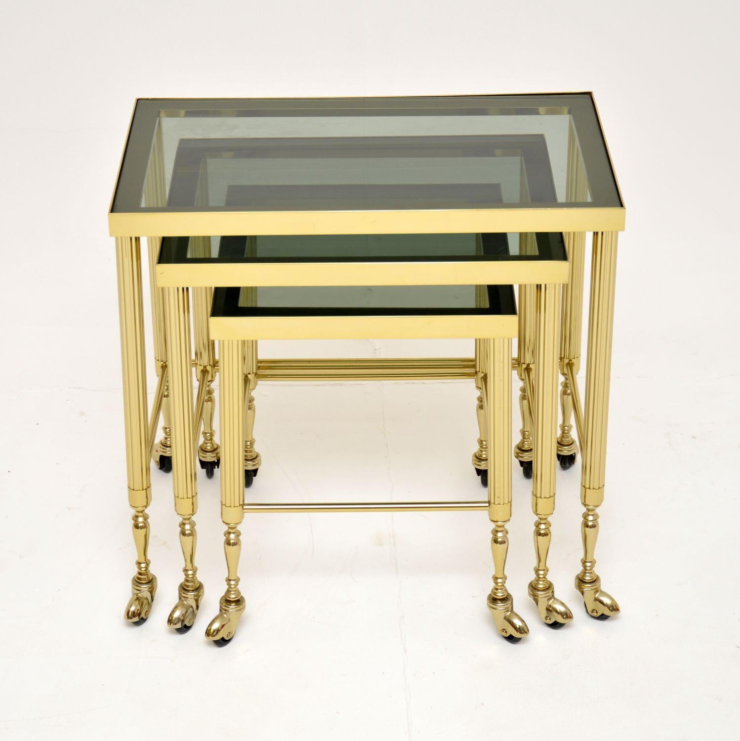 A stunning set of three vintage brass nest of tables. They were made in France, and date from around the 1960’s.

They are a very useful size, the quality is great and they are in excellent condition for their age.

Each table rolls smoothly on